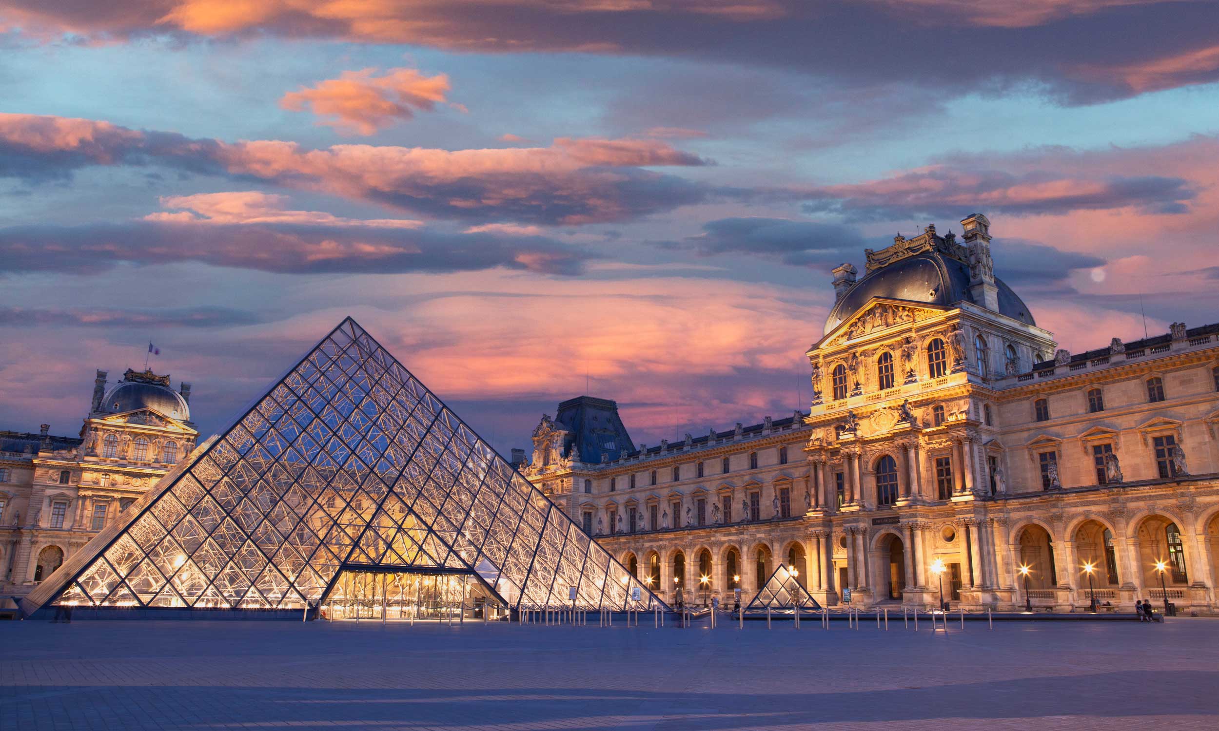Artistic portrait with red and blue lighting creating a dramatic effect