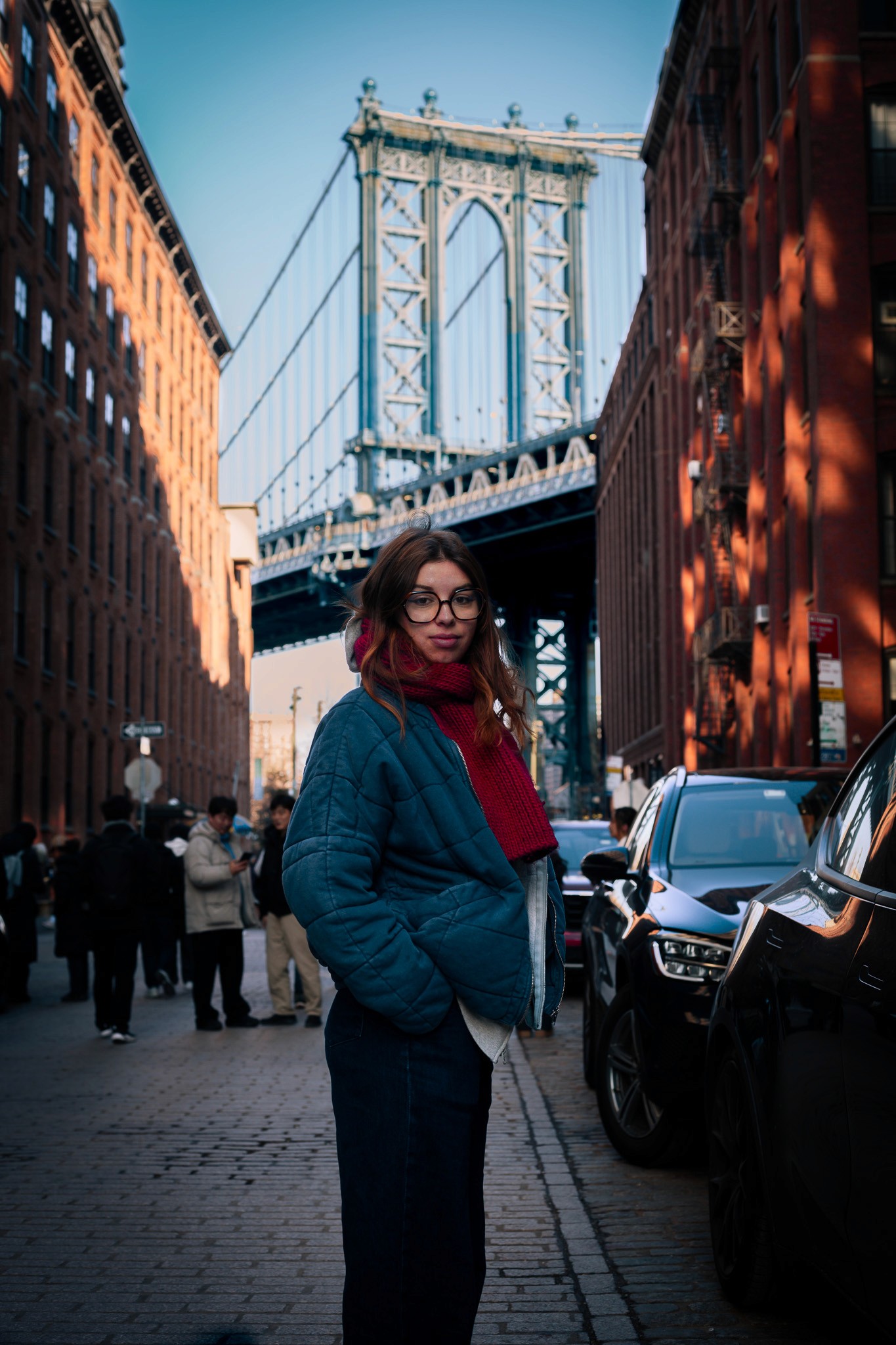 a wamon in front of a bridge