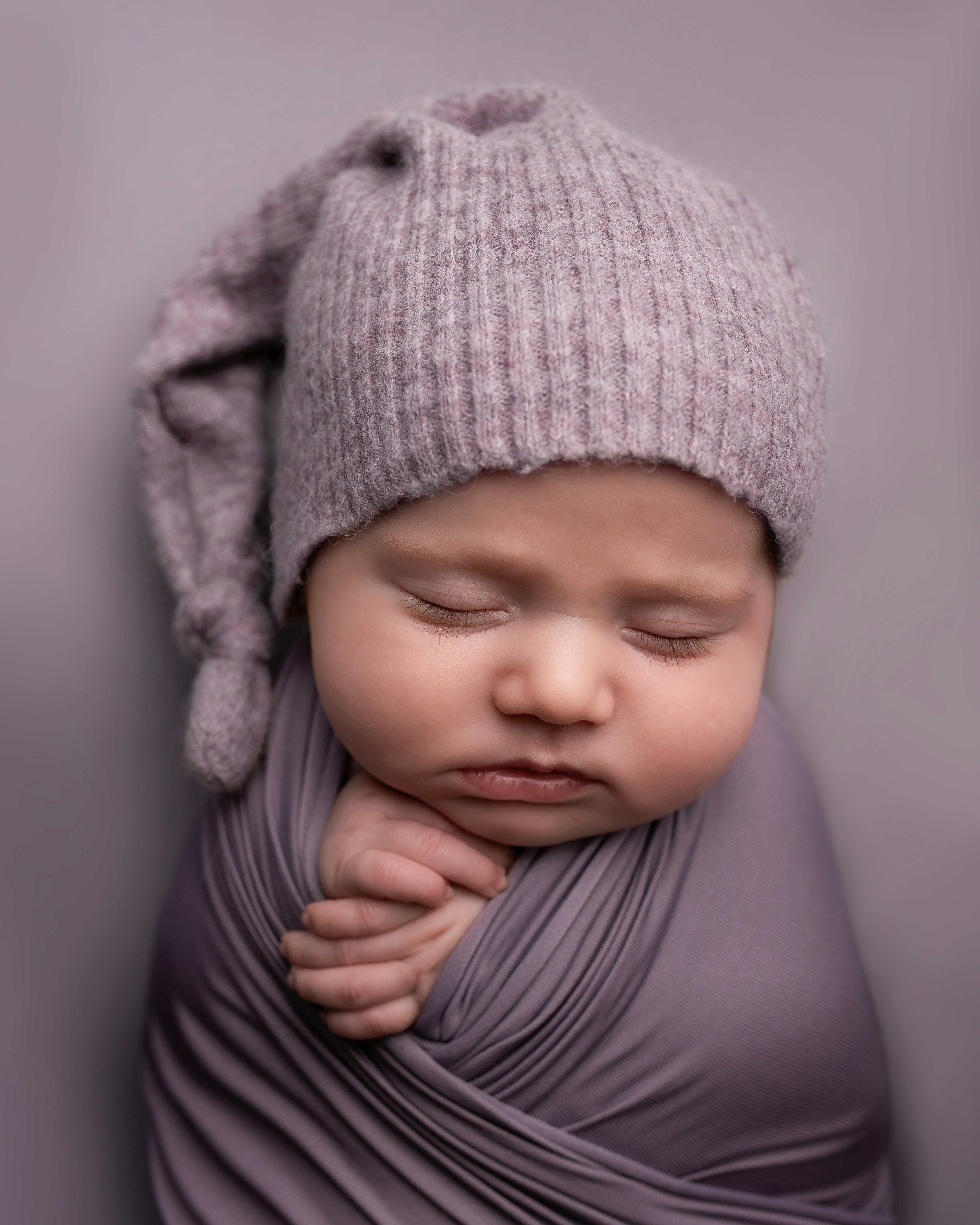 child in gray knit cap