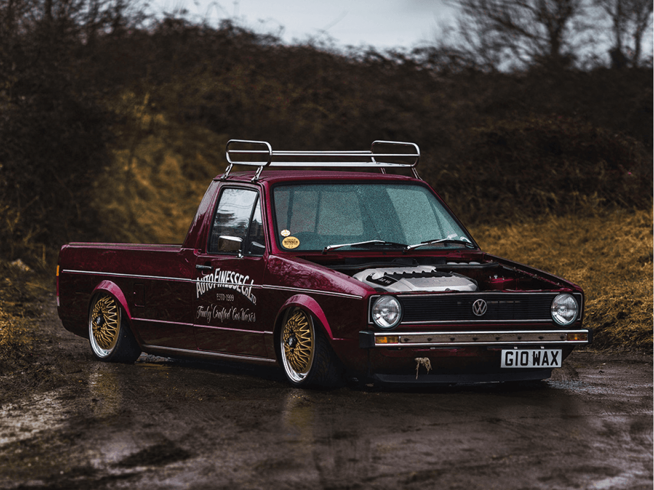 Streetside billboard with flyposters of the Batch.Works brand and illustrations