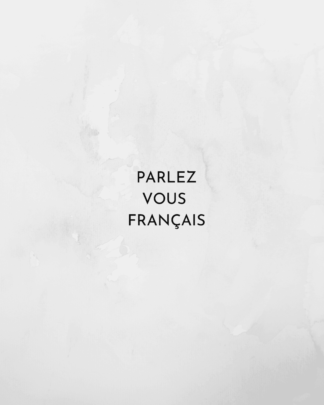Minimal editorial workspace with French magazine, laptop and coffee — premium neutral tones