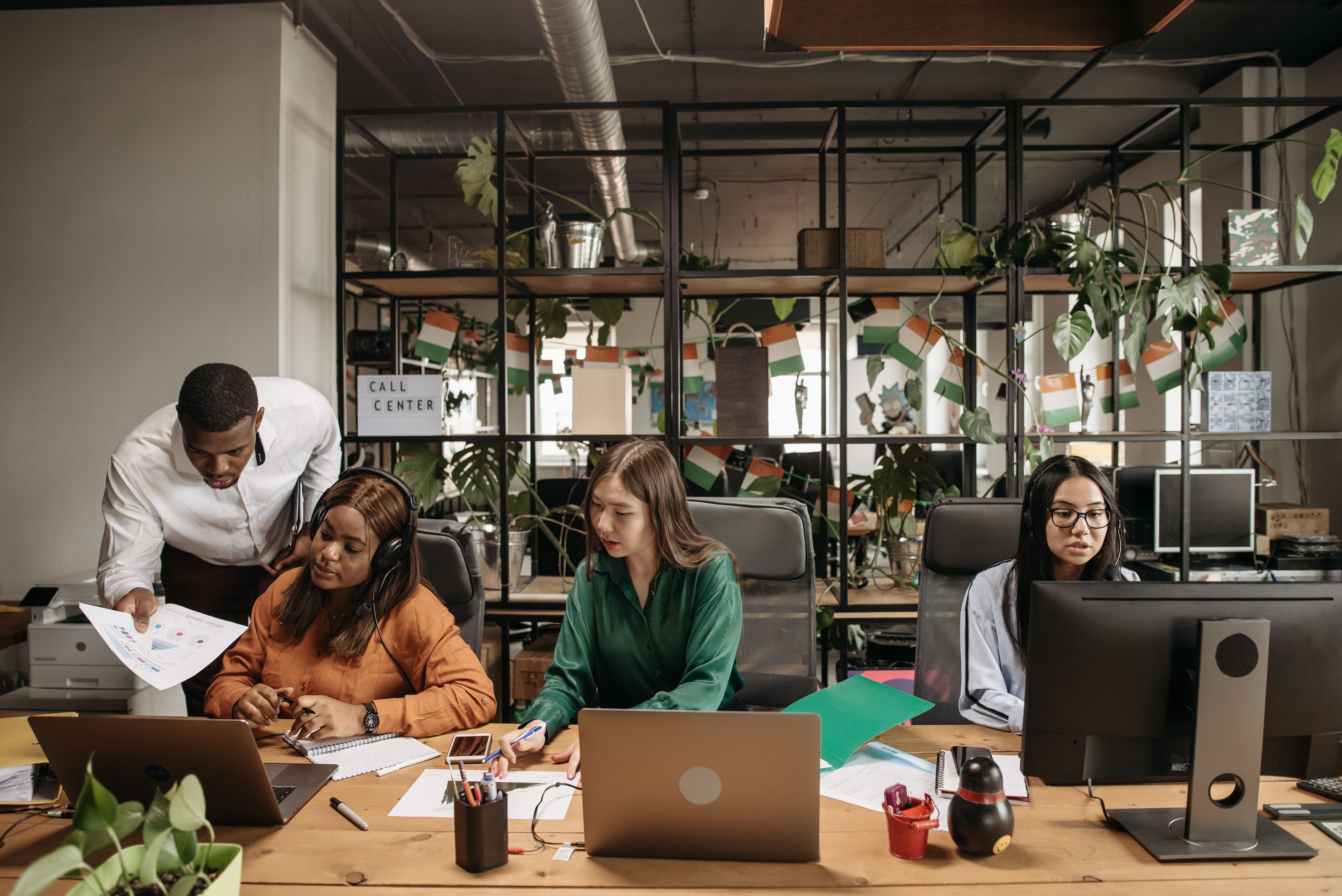 International interns handling daily office tasks at the US workplace via ITP paid internship