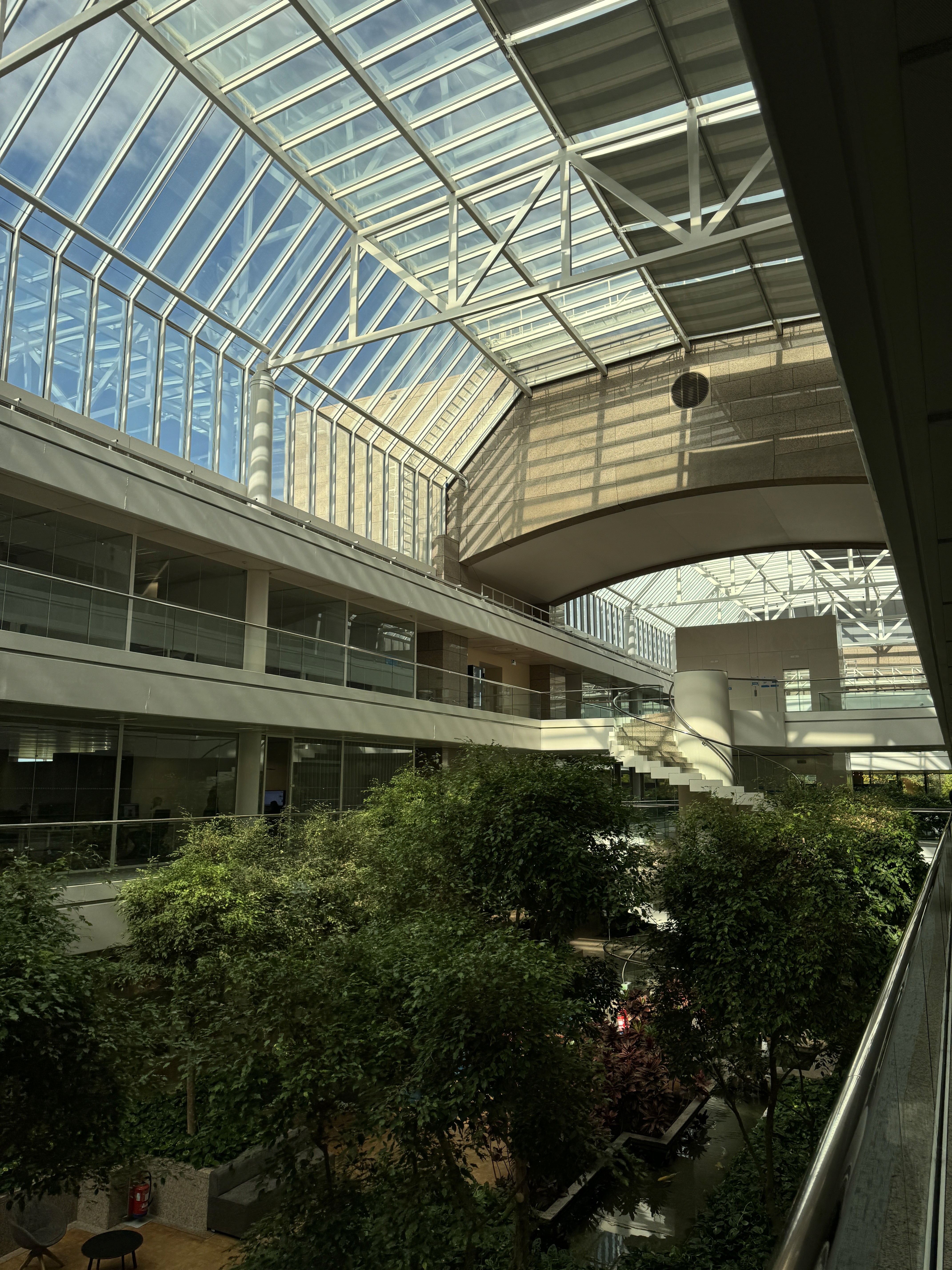Person sitting on a ledge overlooking New York City skyline