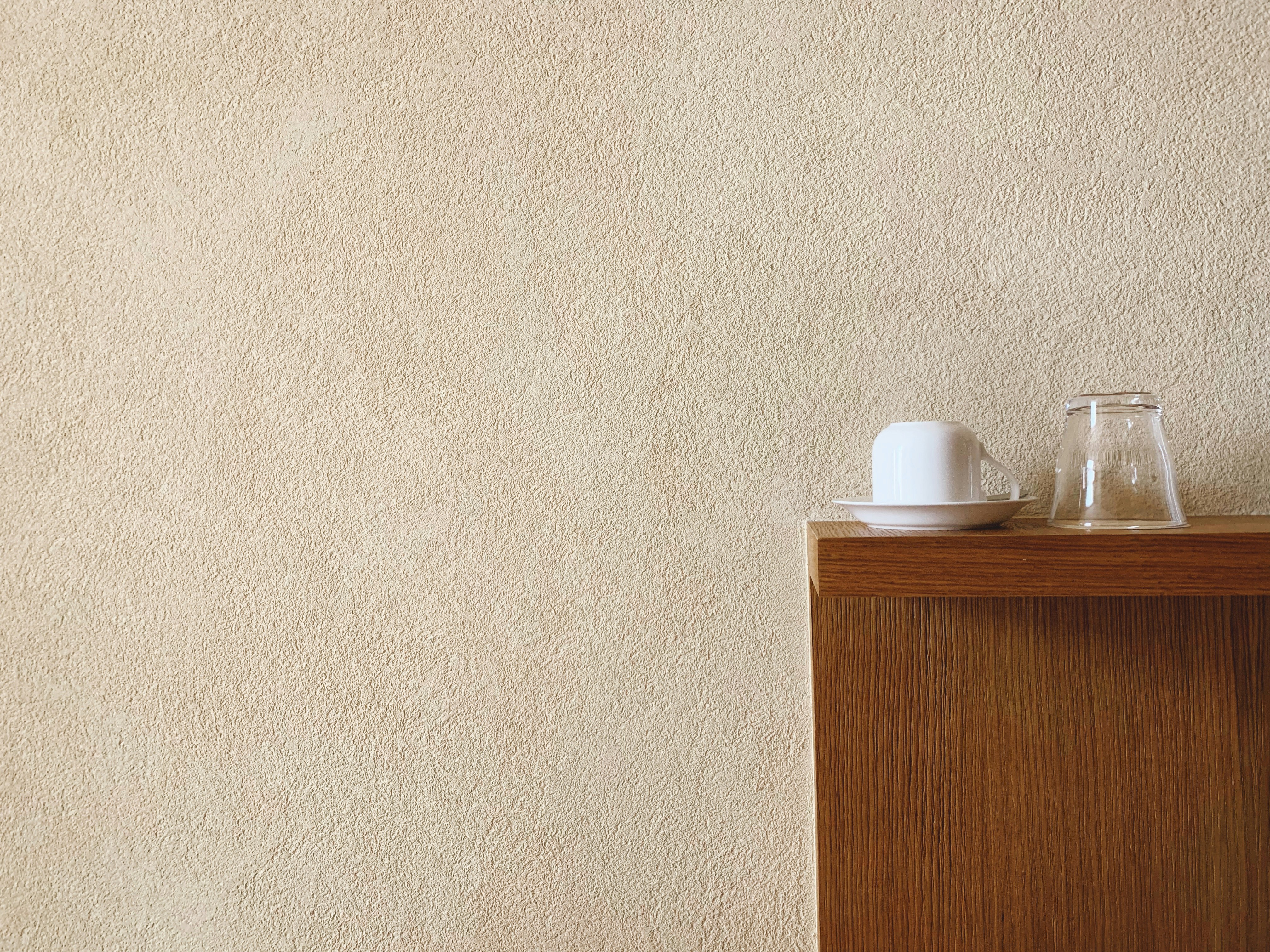 white plastic bottle on brown wooden table