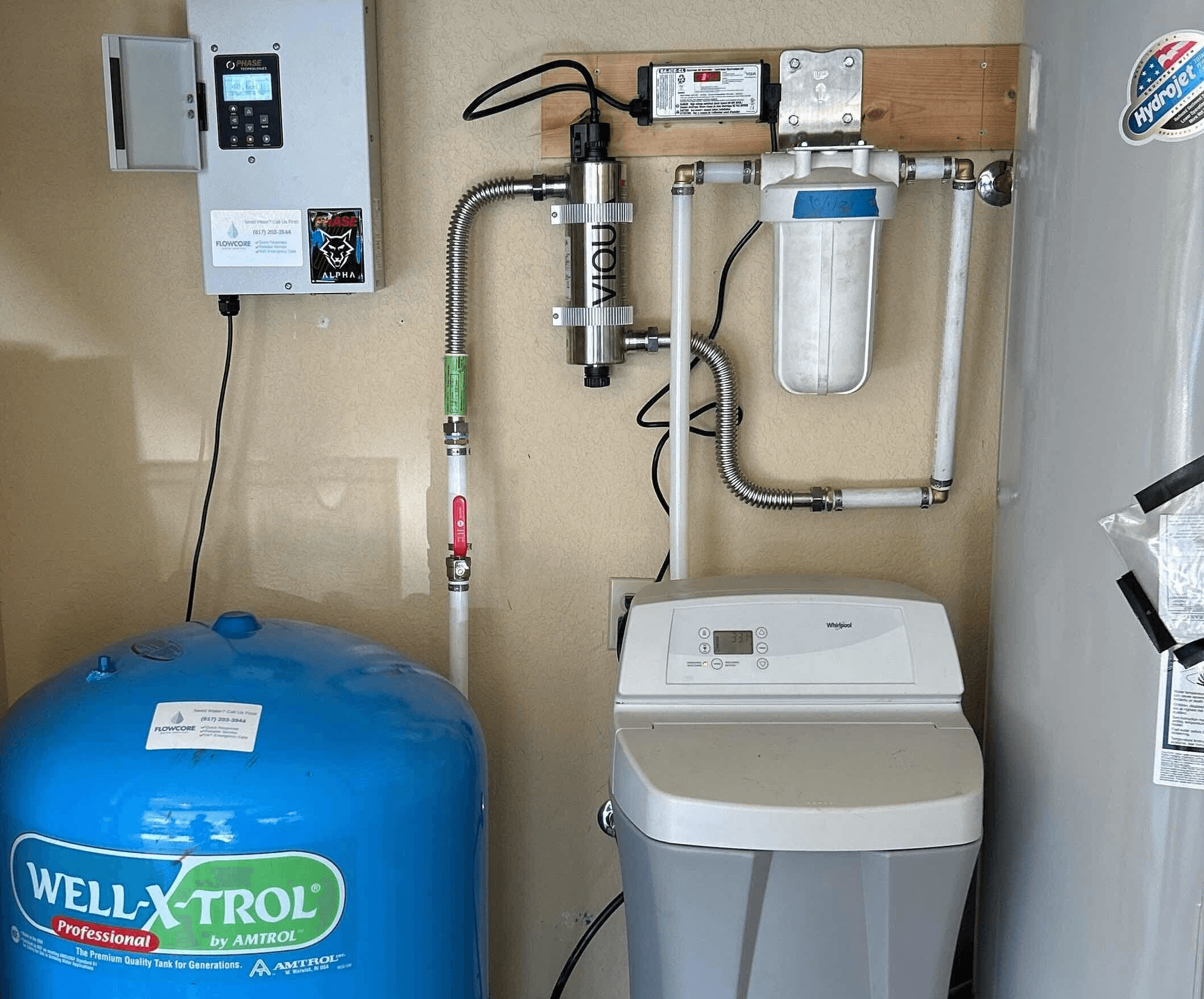 Phase Tech Alpha Drive constant-pressure controller installed on a single-phase well pump after iron bacteria rehab