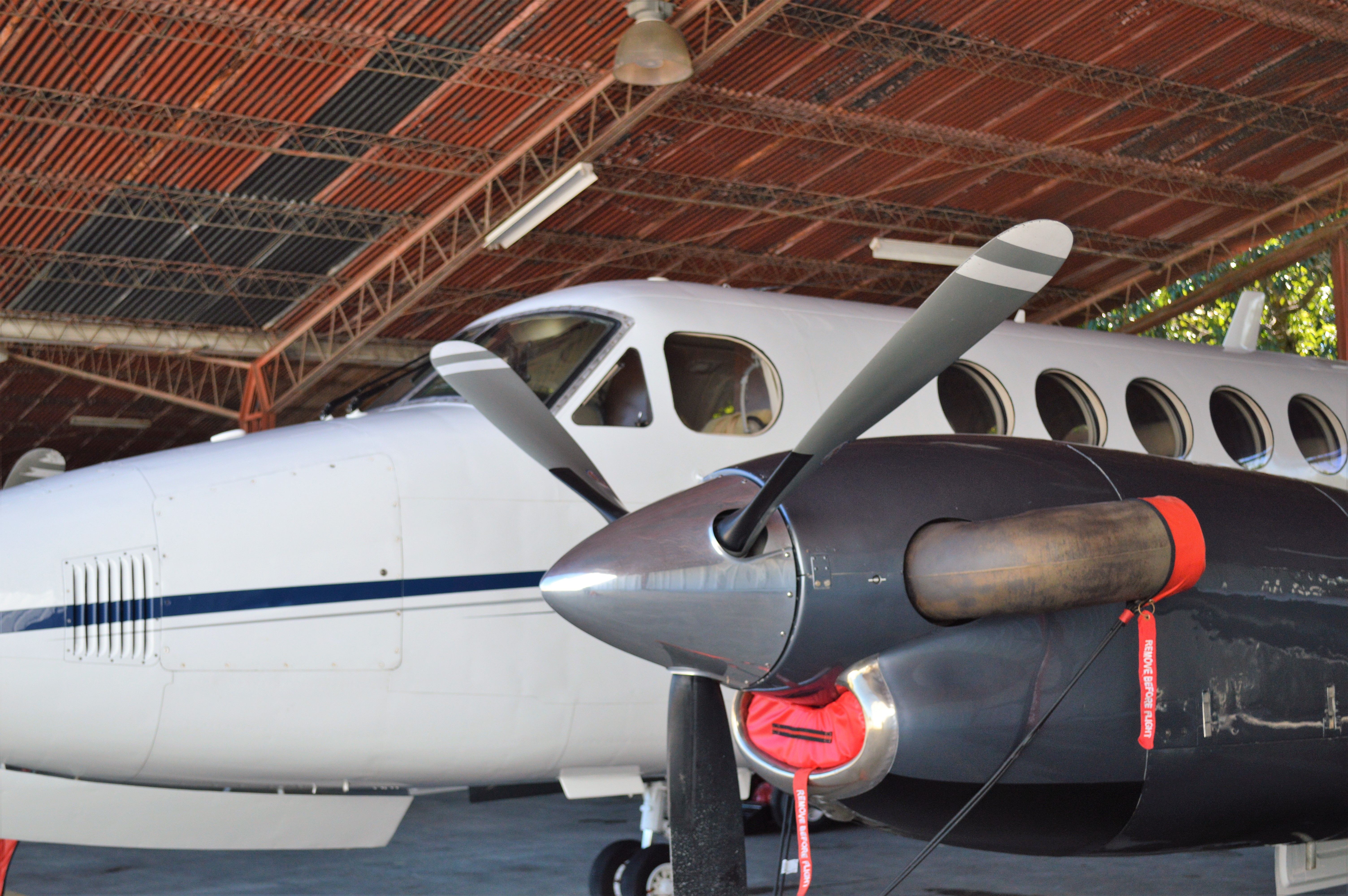close-up-of-a-private-airplane-with-a-propeller-inside-a-hangar-in-san-salvador. - césar+mirna-choto (pexels)