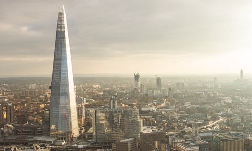 Photo of the shard tower in london with a London skyline backdrop