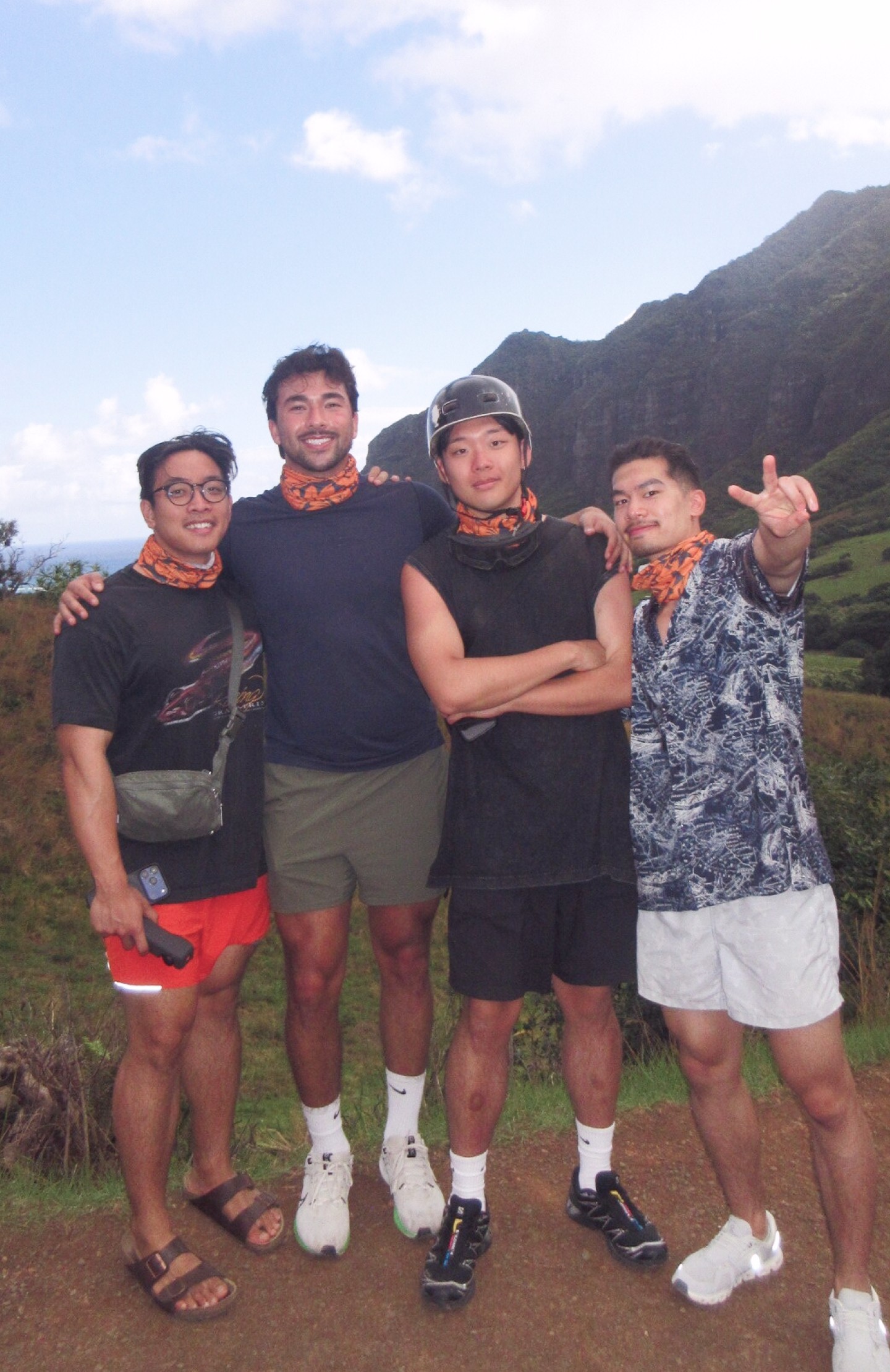 a man that is standing up with headphones on