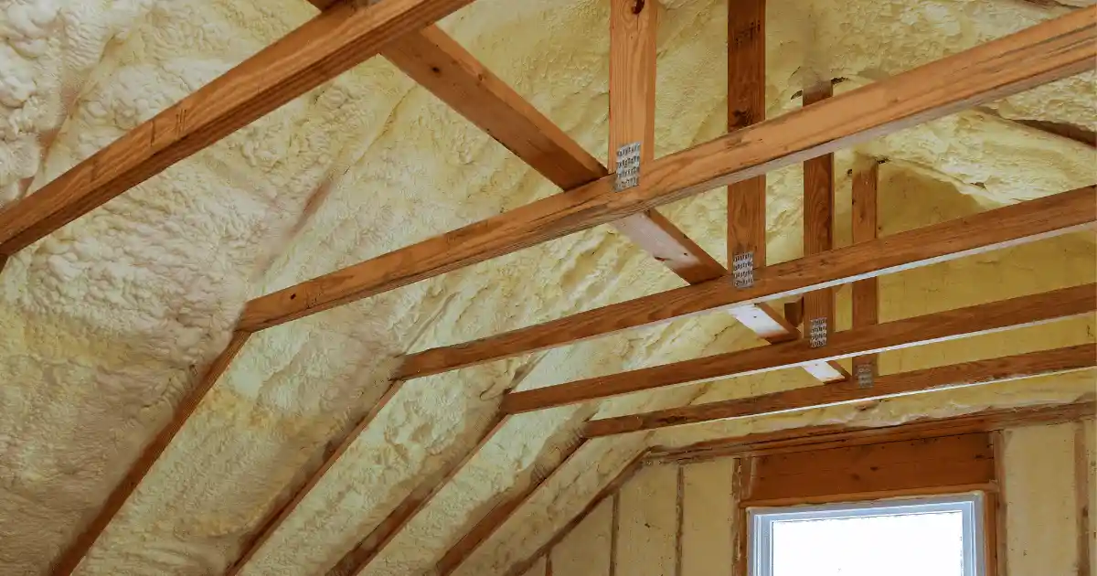 Home attic refitted with spray foam insulation