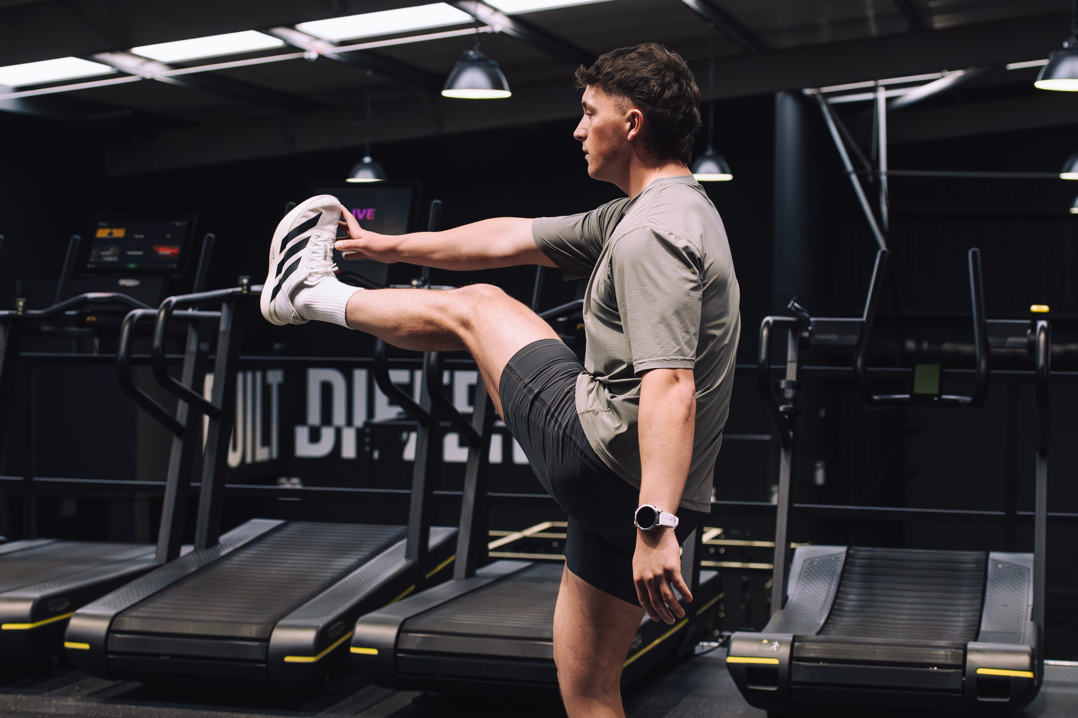 man stretching leg -  IV Therapy for Athletic Performance and Recovery