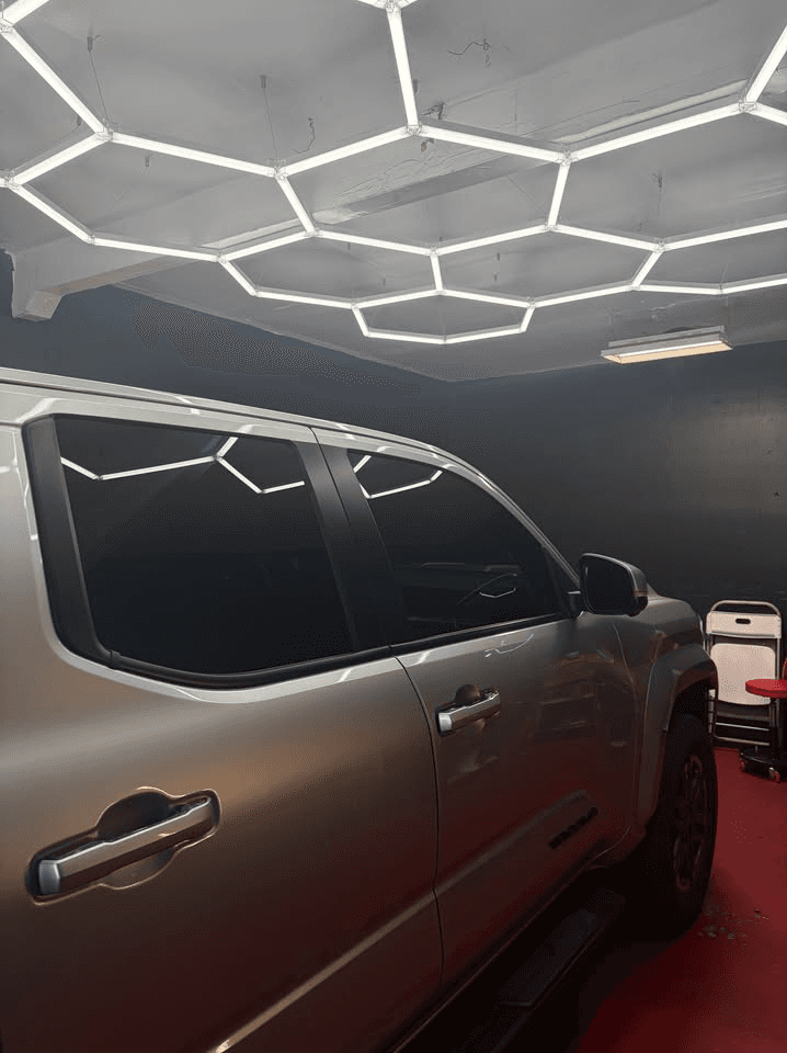 Pickup truck with dark window tint for UV protection, privacy, and comfort.