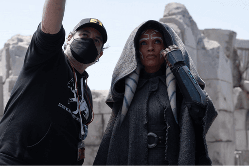 Dave Filoni in a mask directing Rosario Dawson on set of Ahsoka