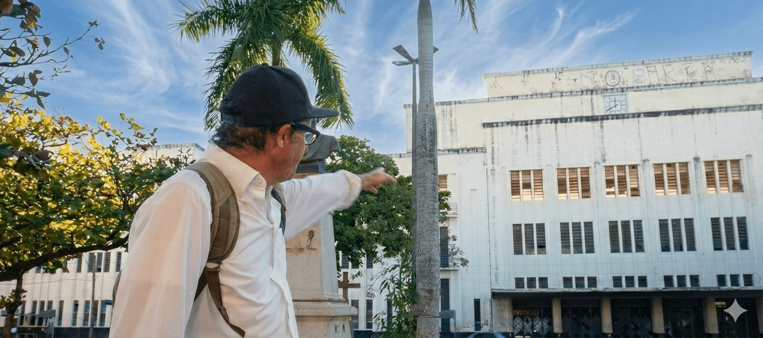 Three children jumping in burlap sacks during a race.