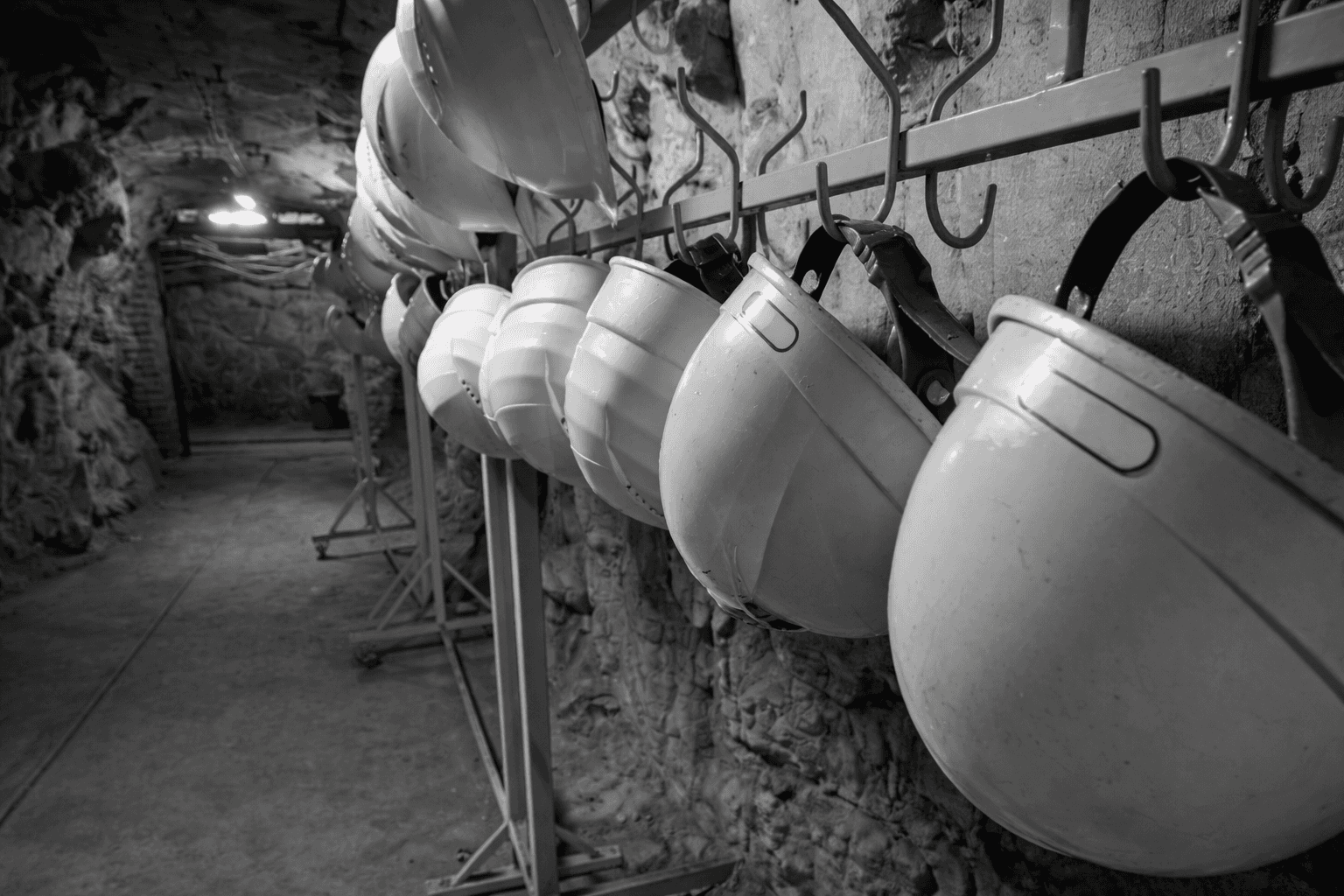 yellow and black truck on road near mountain during daytime
