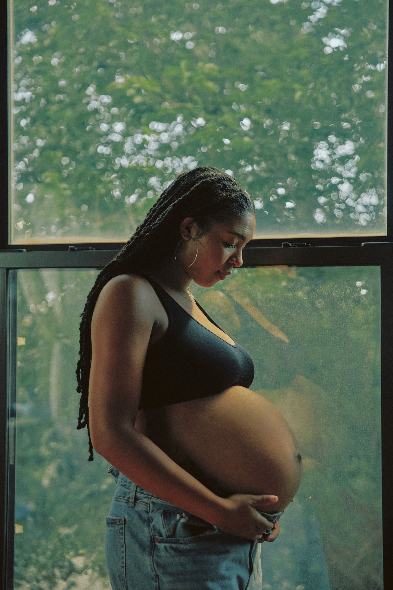 American flag flying against a cloudy sky
