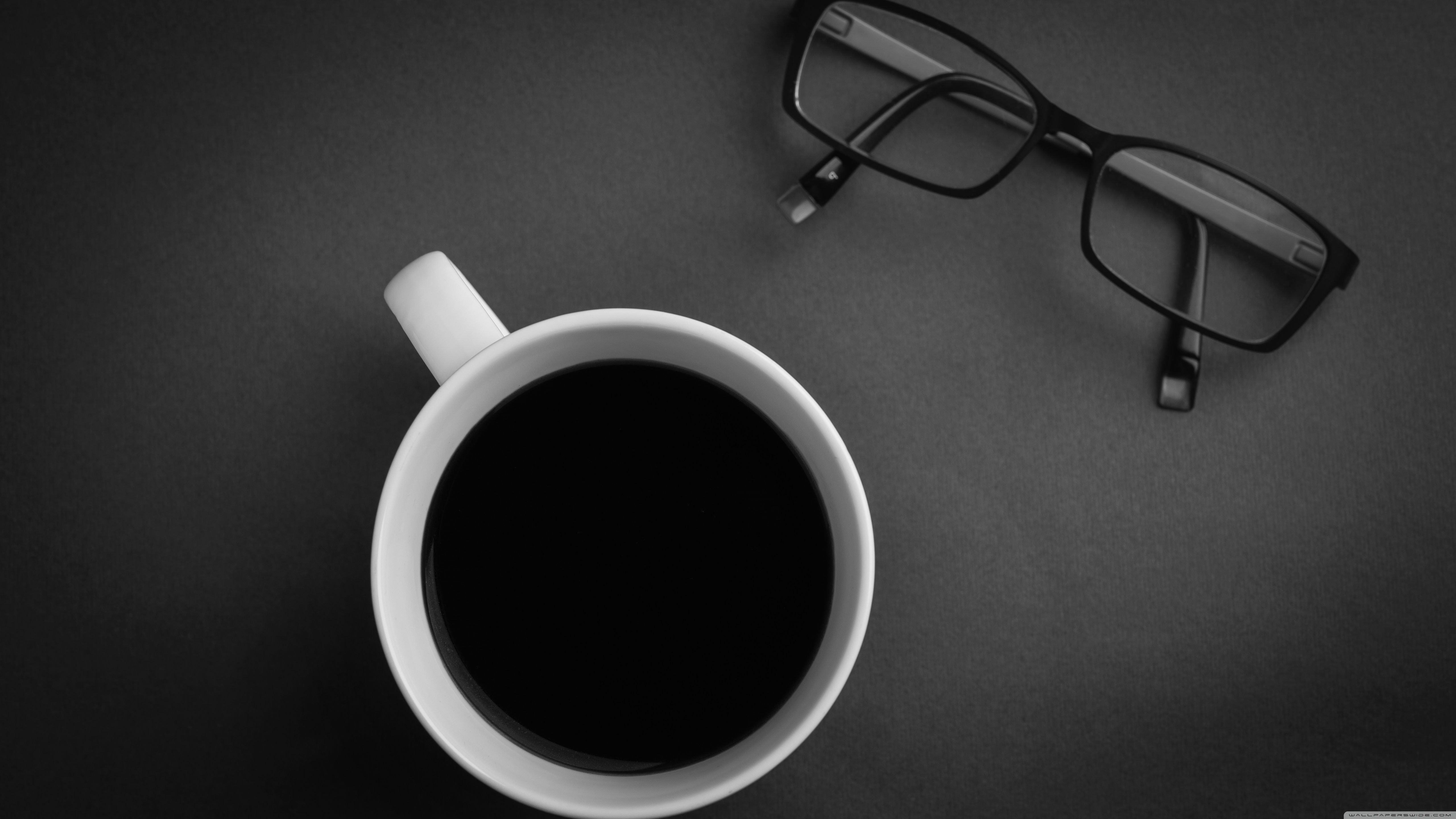 Stainless steel water bottle on orange background