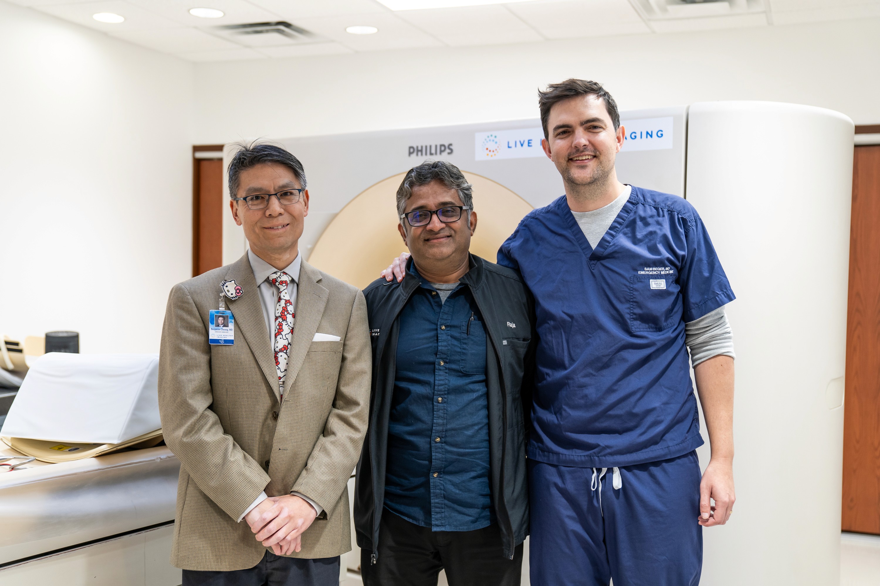 Co-Founder Sam Beger at an outpatient imaging center standing in front of a Philips CT scanner, highlighting their partnership with Tether Supervision to implement real-time virtual direct supervision for contrast-enhanced CT and MRI procedures