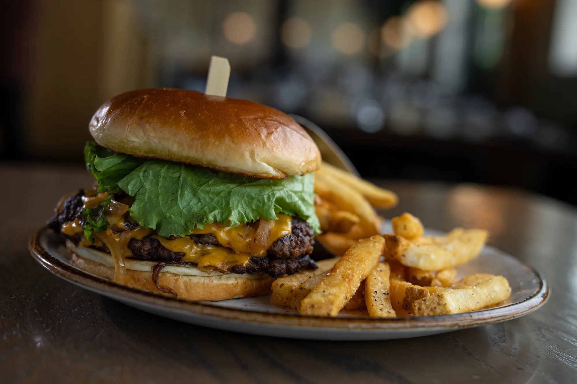 Cheeseburger with fries on a plate