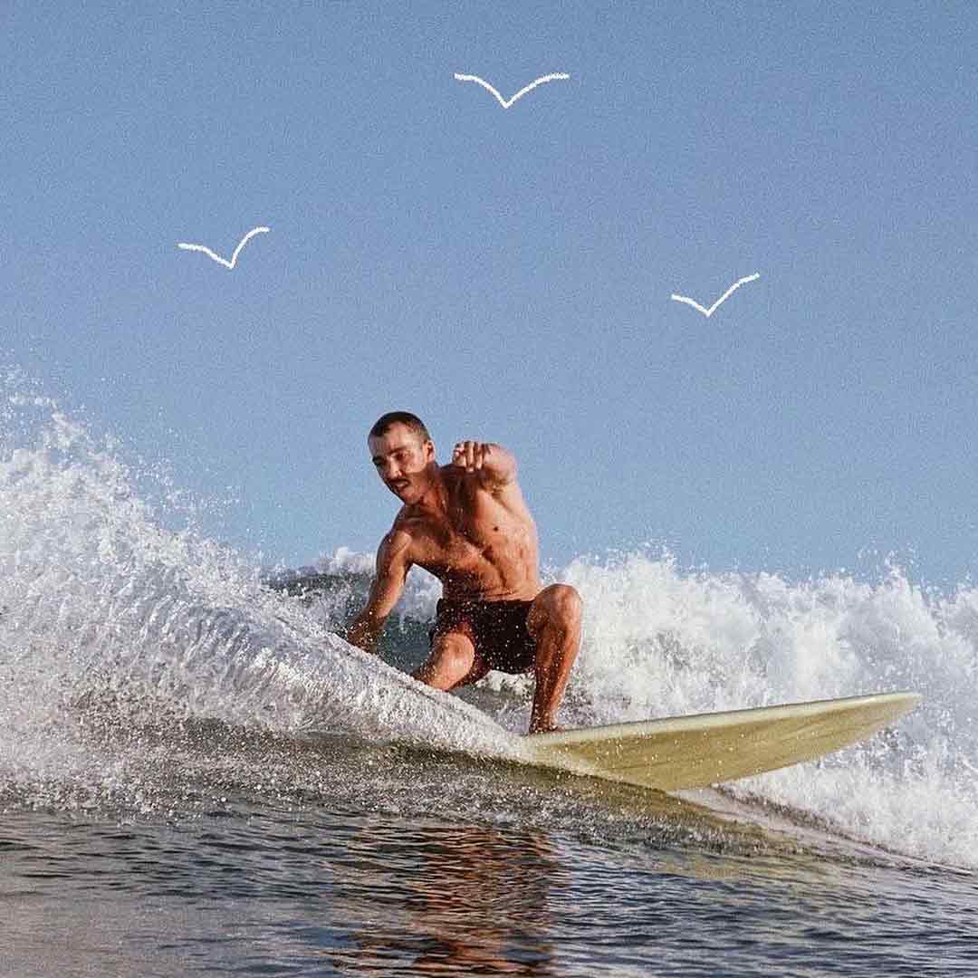 Man surfing wave on white board – surfboard rental in puerto-escondido