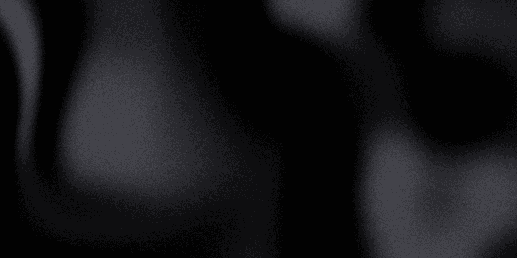 A gradient image transitioning from dark black to light gray tones.