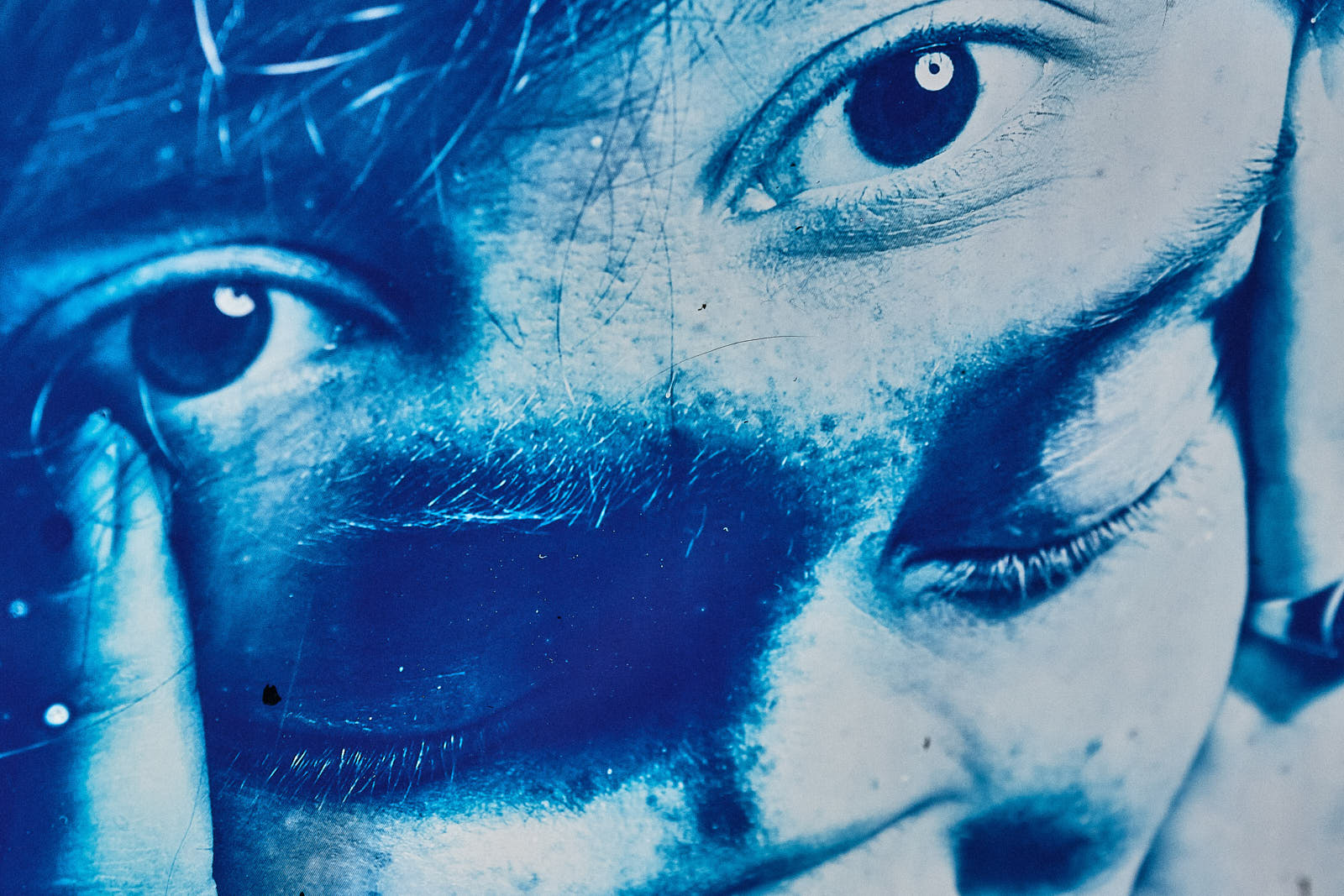 Stack of modern books and magazine with minimalist cover design on leather chair
