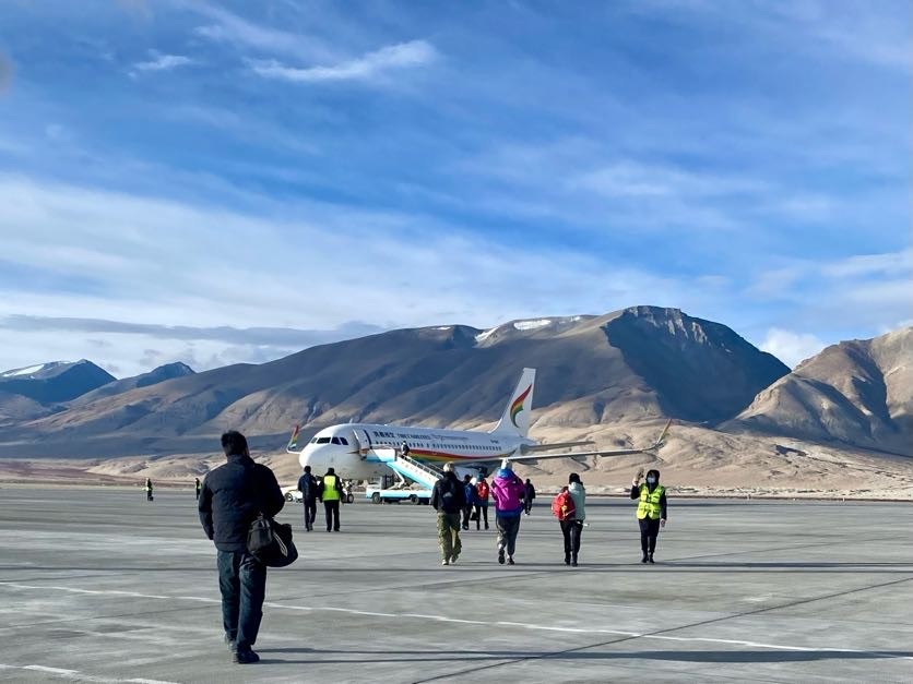 The potala palace stands majestically in the distance.