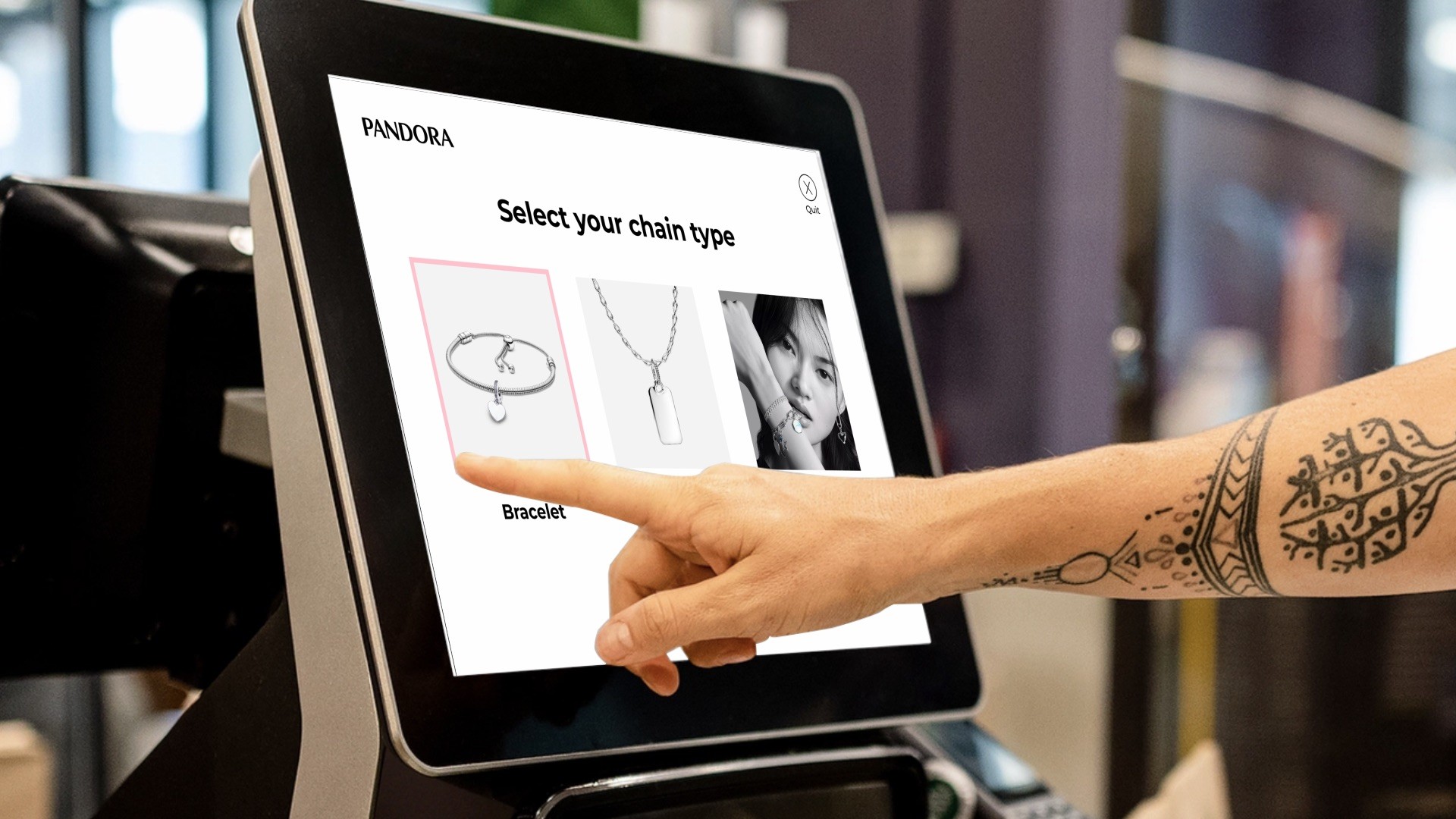 woman using a store kiosk