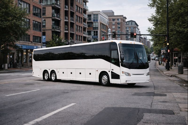 A smiling man in a red jersey standing confidently in a gym. Text: Zane Mitchell – Wellness Coach.