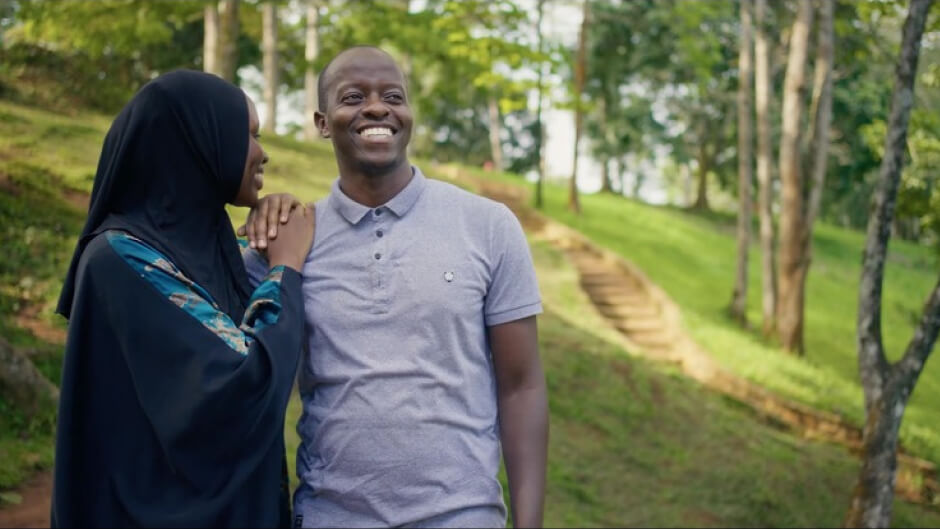 KATUMBA & JAMIRAH FAIRUZI from Uganda standing in a woodland