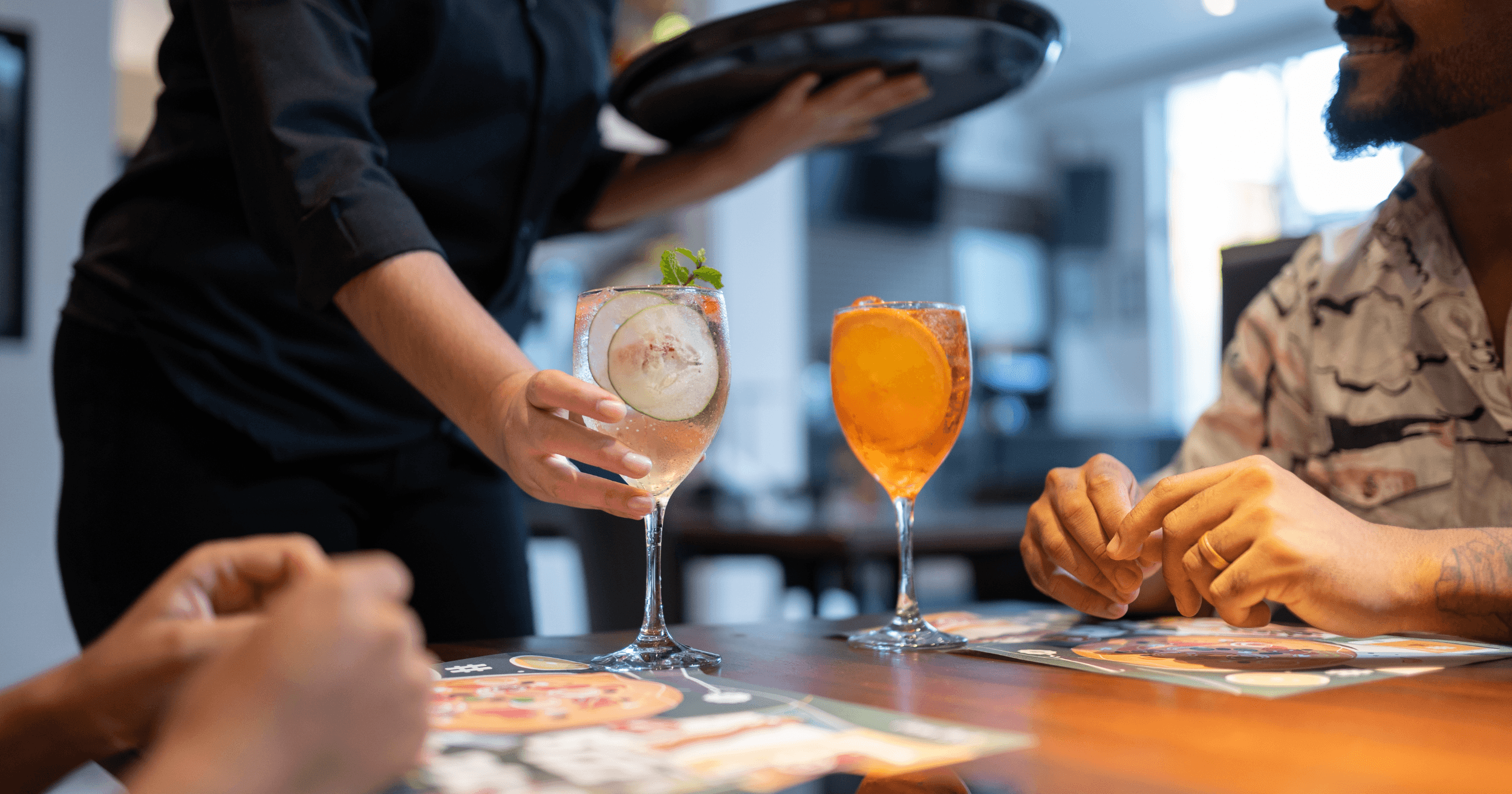 A Filipino restaurant business owner assisting a customer