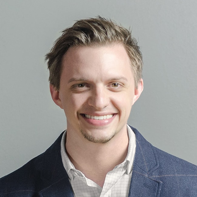 Portrait of Seth Hartman smiling