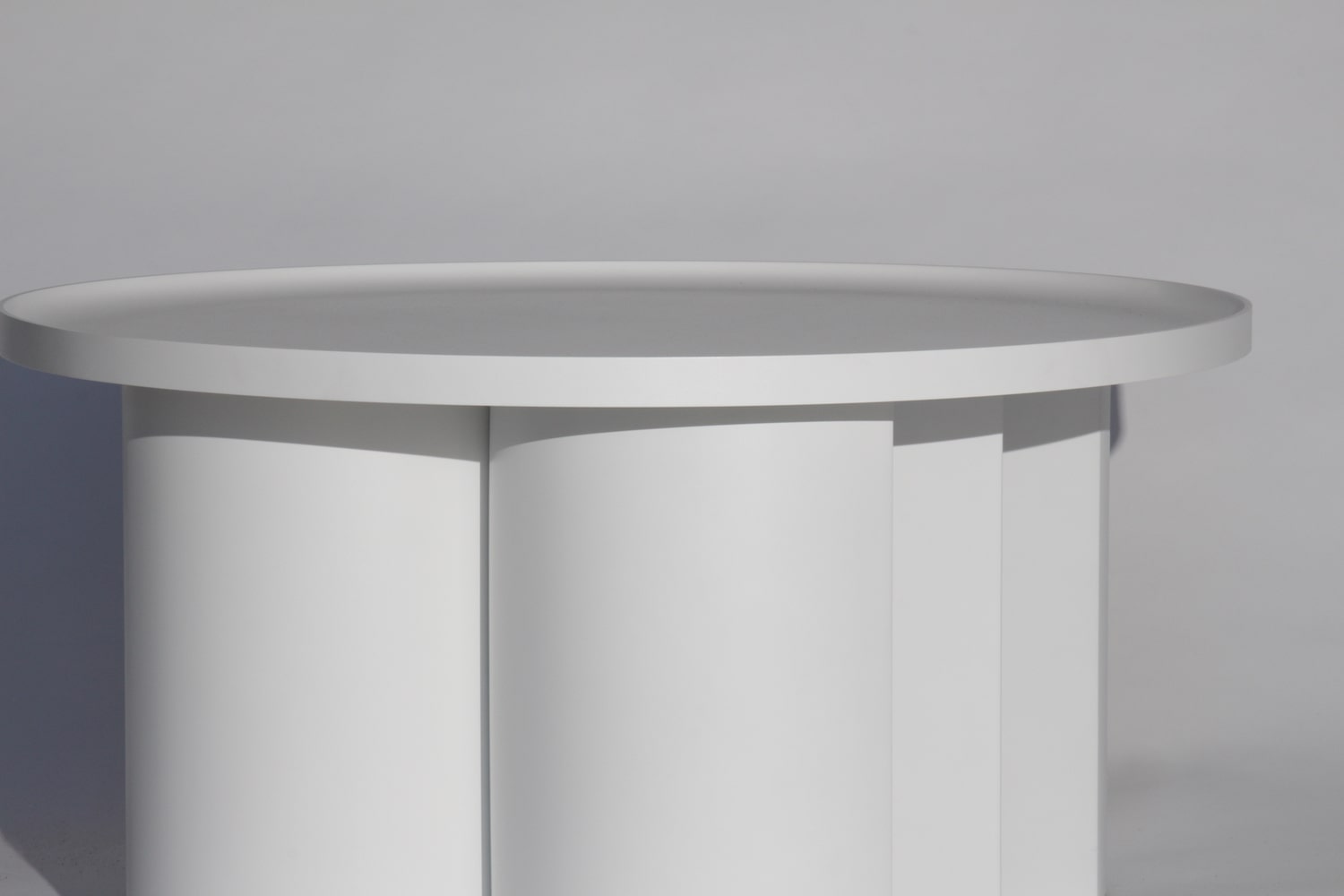 Close-up of Stella table showing refined surface finish and material clarity by Jiri Krejcirik