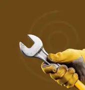 Person inserting coin into piggybank