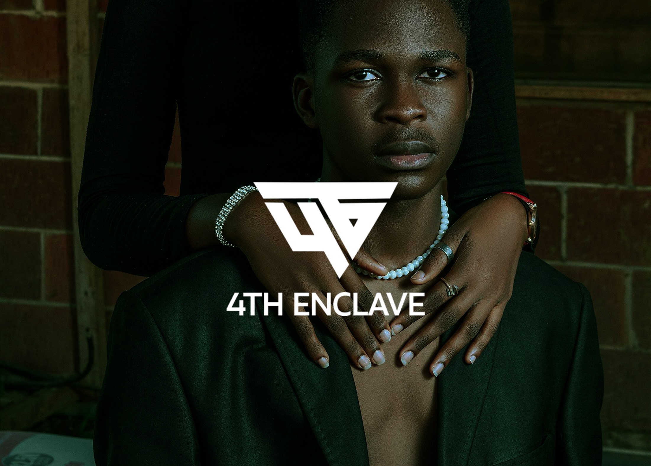 Minimalist black and white 4th Enclave logo embossed on a textured background.