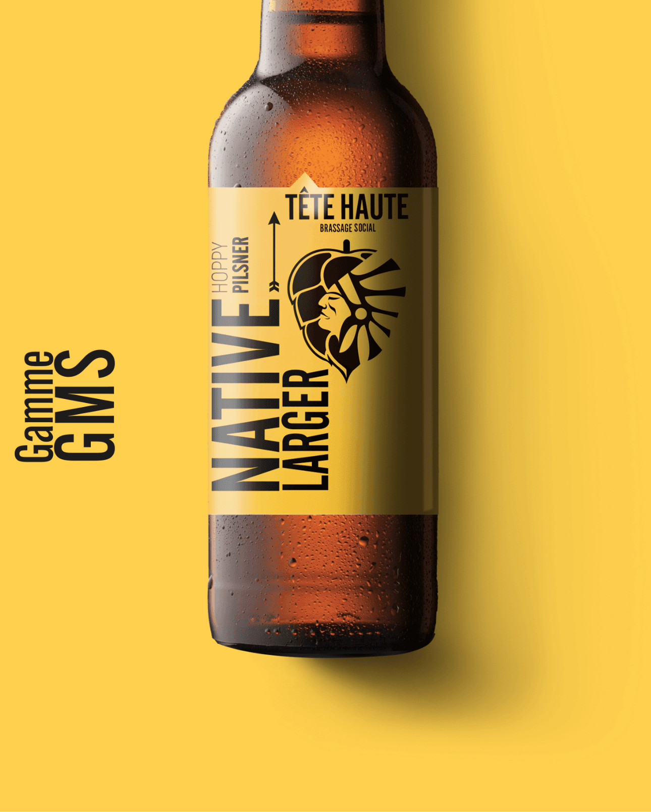 Packaging jaune d'une bouteille de bière Tête Haute