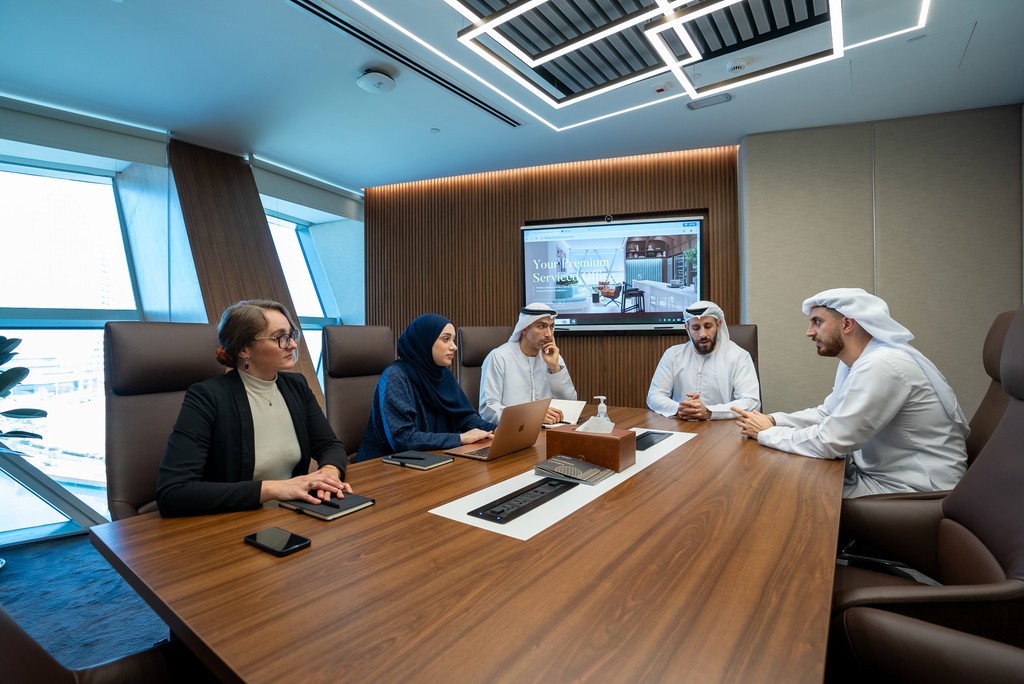 High-end business lounge with a collaborative work environment, perfect for strategy sessions and client meetings.