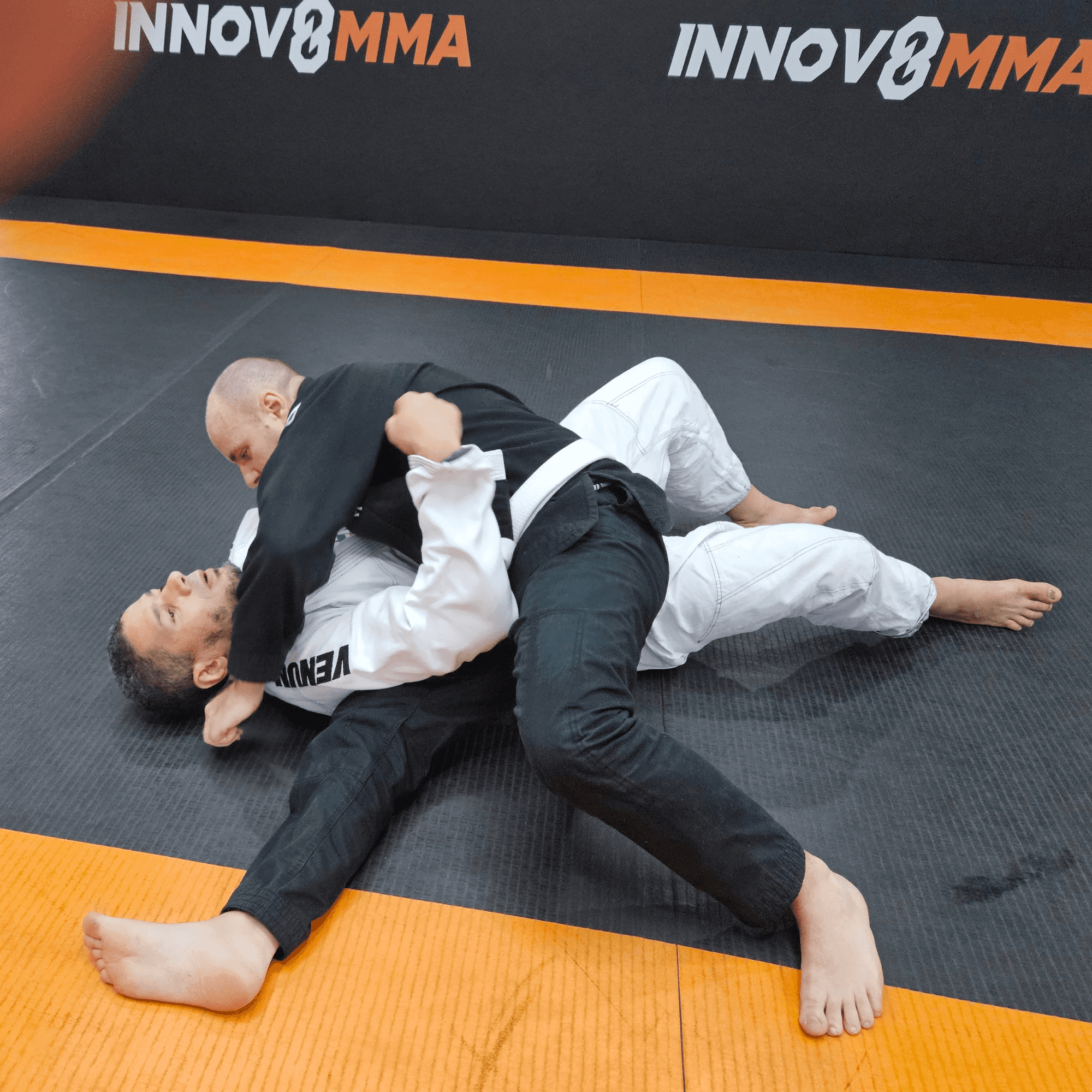 BJJ students training