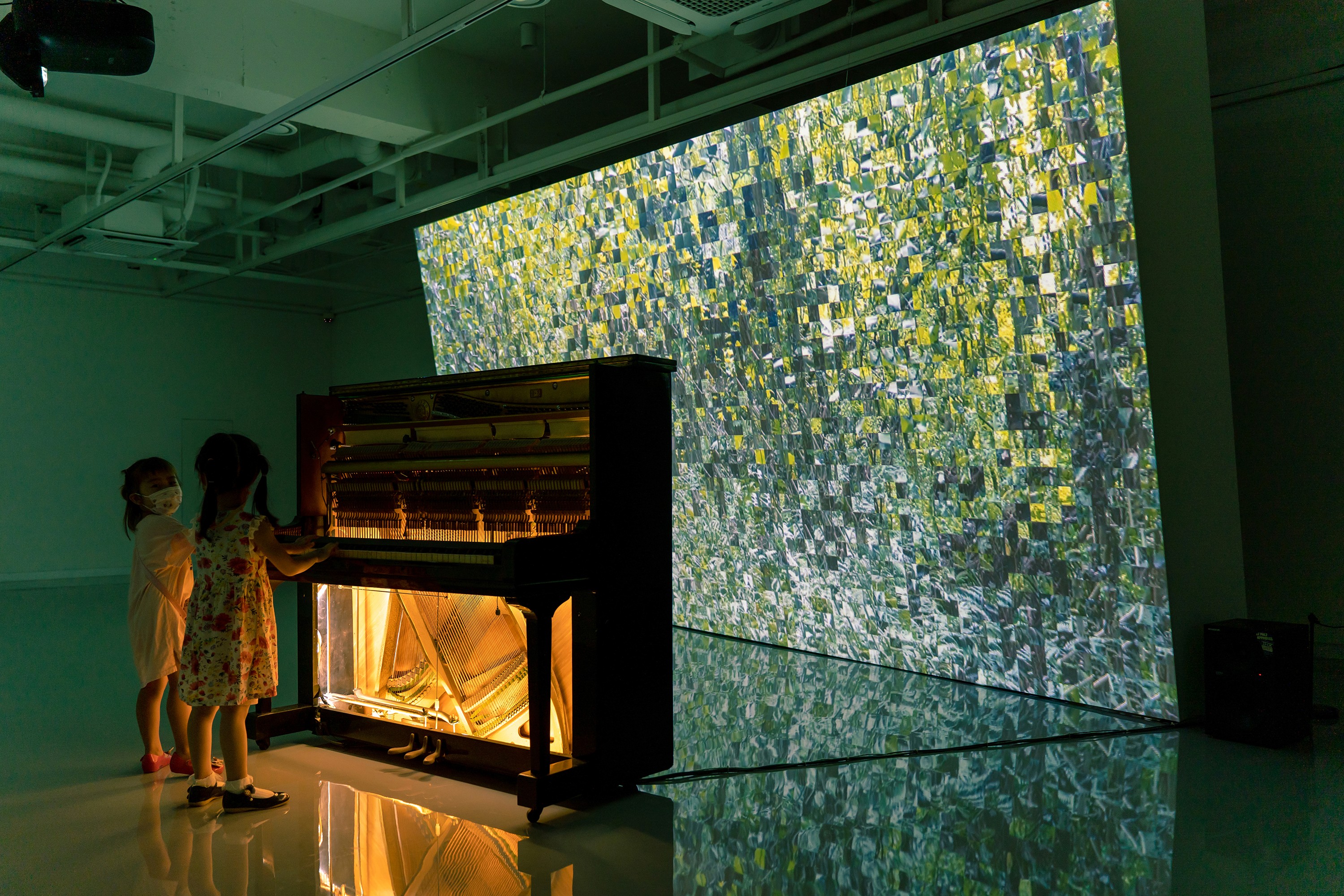 Person in white astronaut helmet with neutral background
