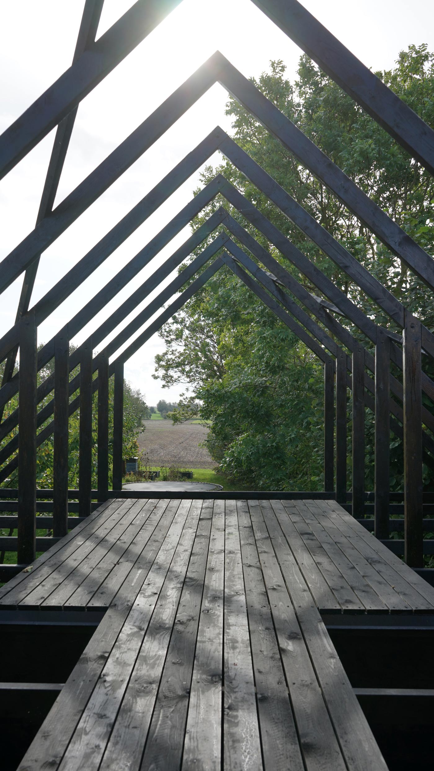 Bakkely Sauna and Guest House timber roof structure and terrace on Ærø designed by architect Asger Risborg Jakobsen