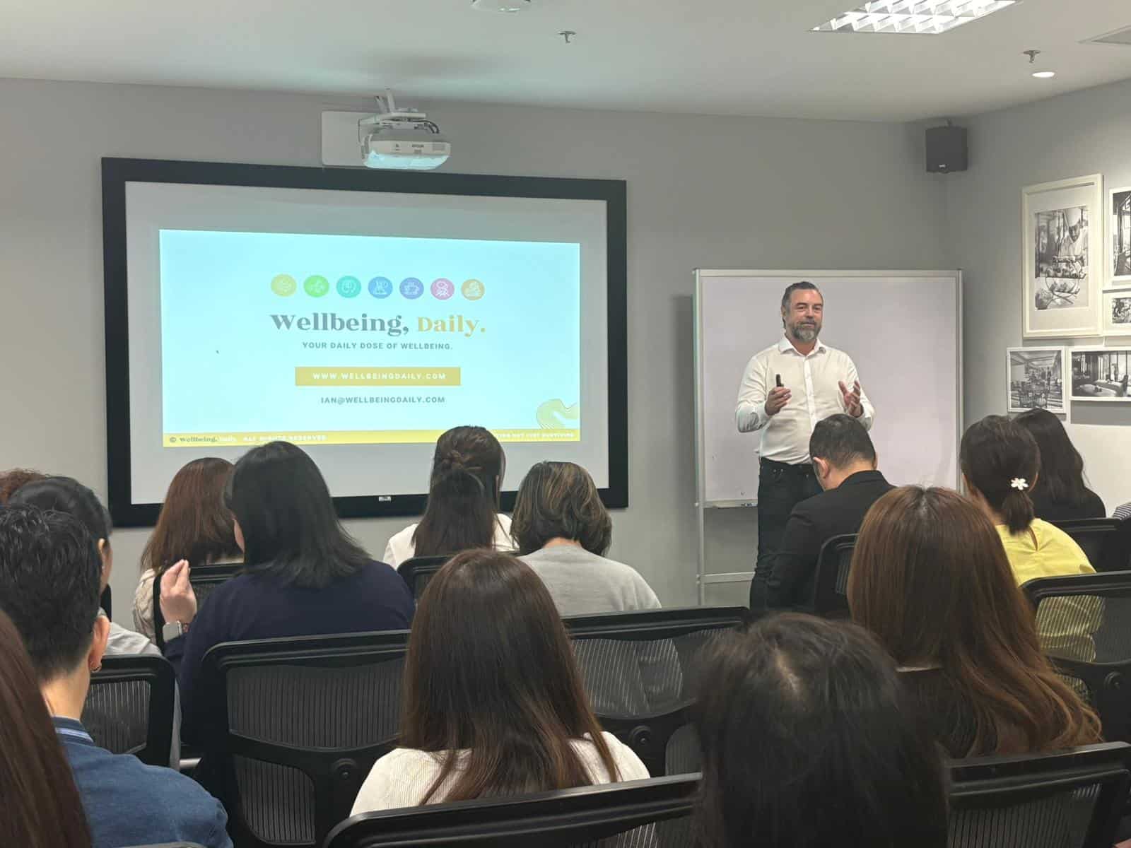 Ian Collins from Wellbeing Daily delivering educational workshop about workplace wellbeing