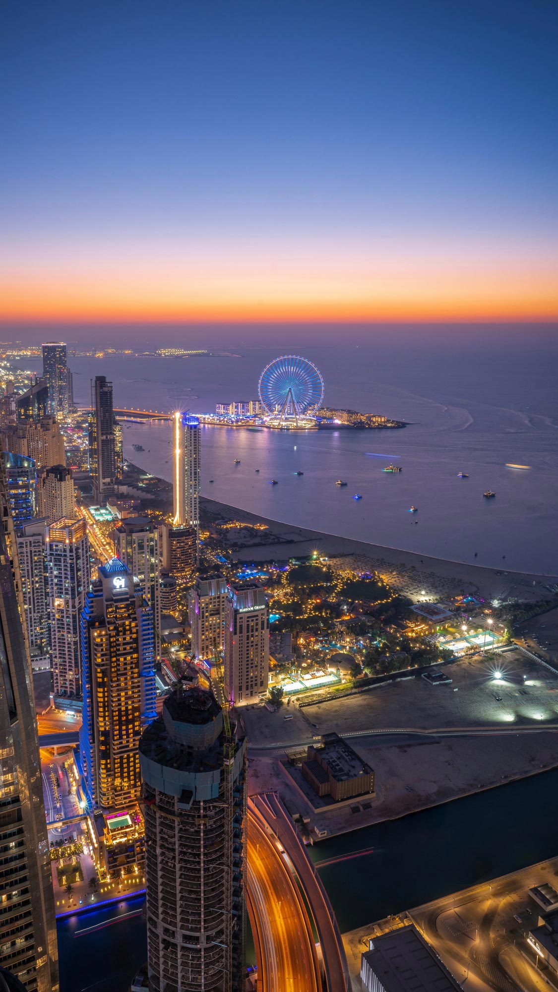 an aerial view of a city at night