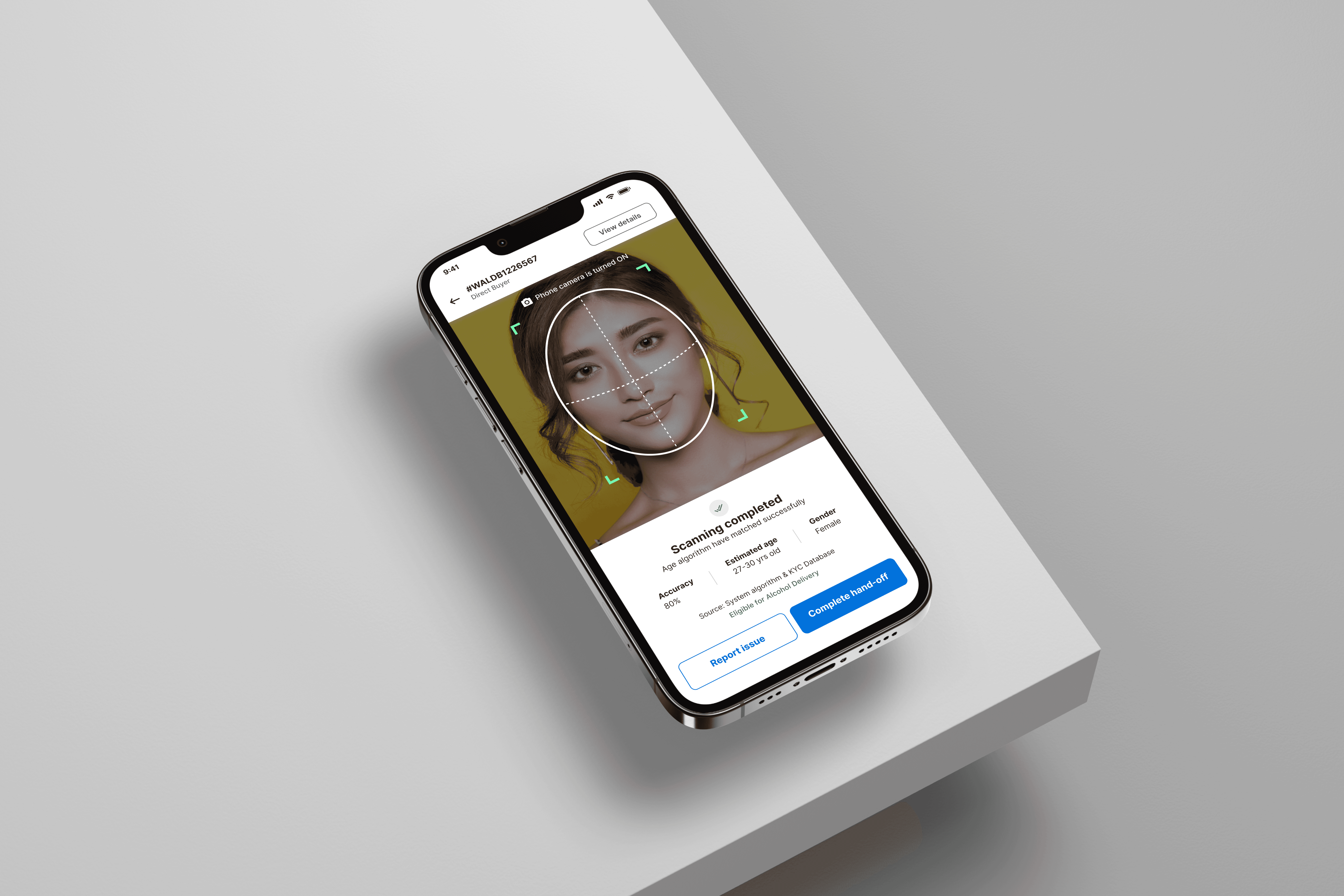 Woman pressing power button on an iMac desktop computer.