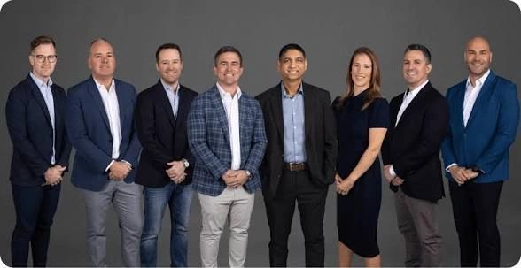 a black and white living room with a large tv