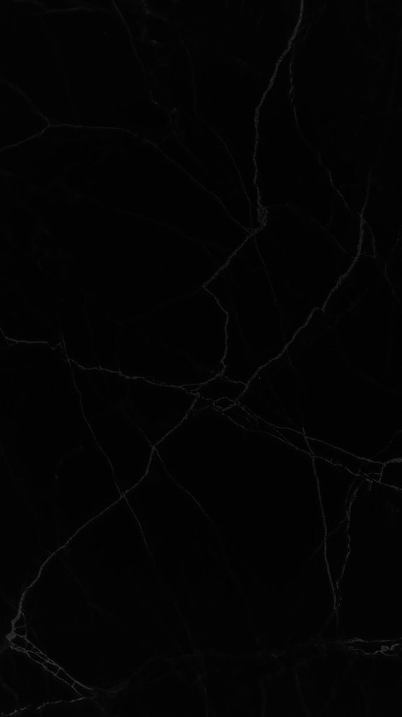 a black and white photo of a dark background