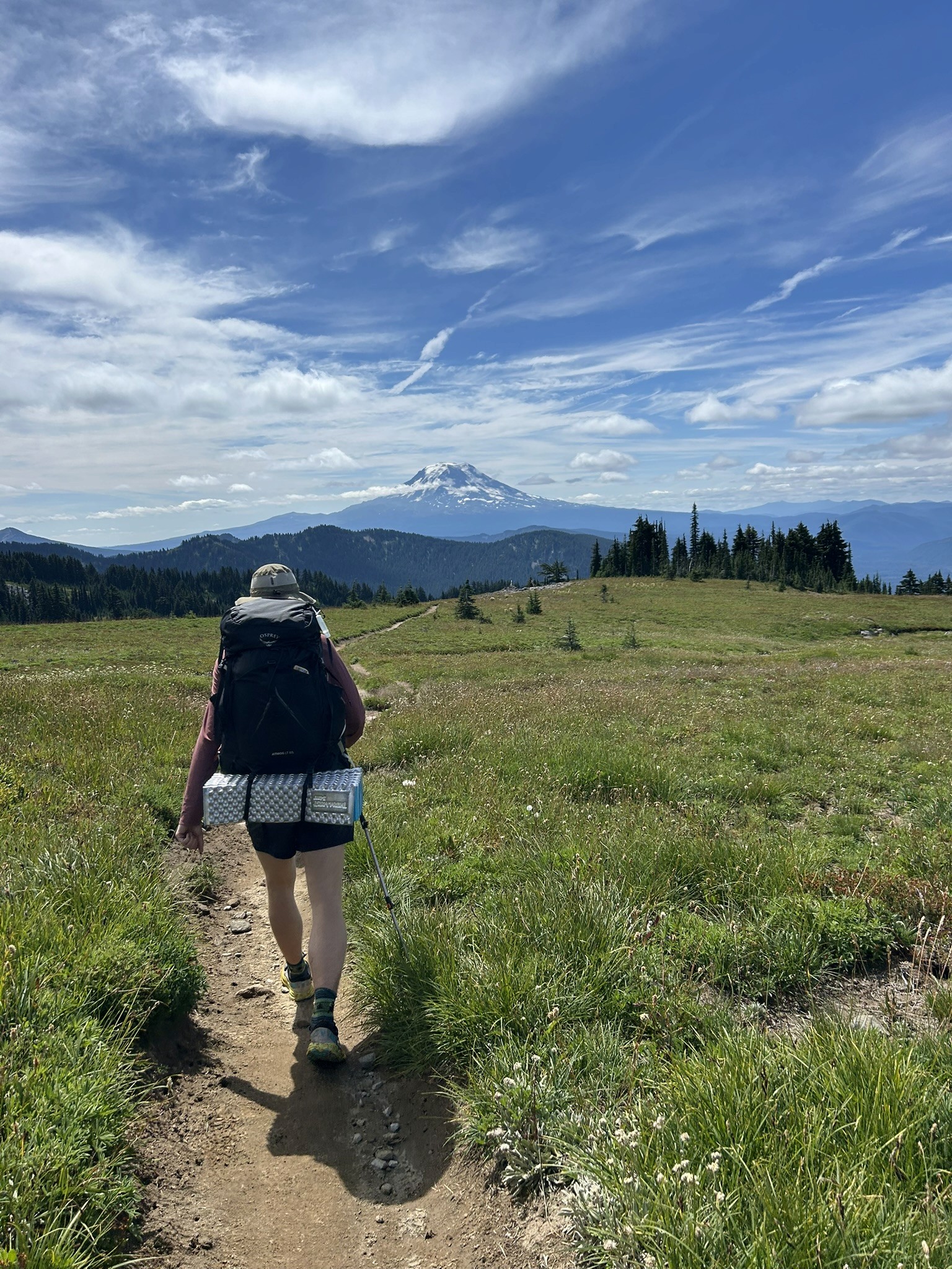 man filming on beach