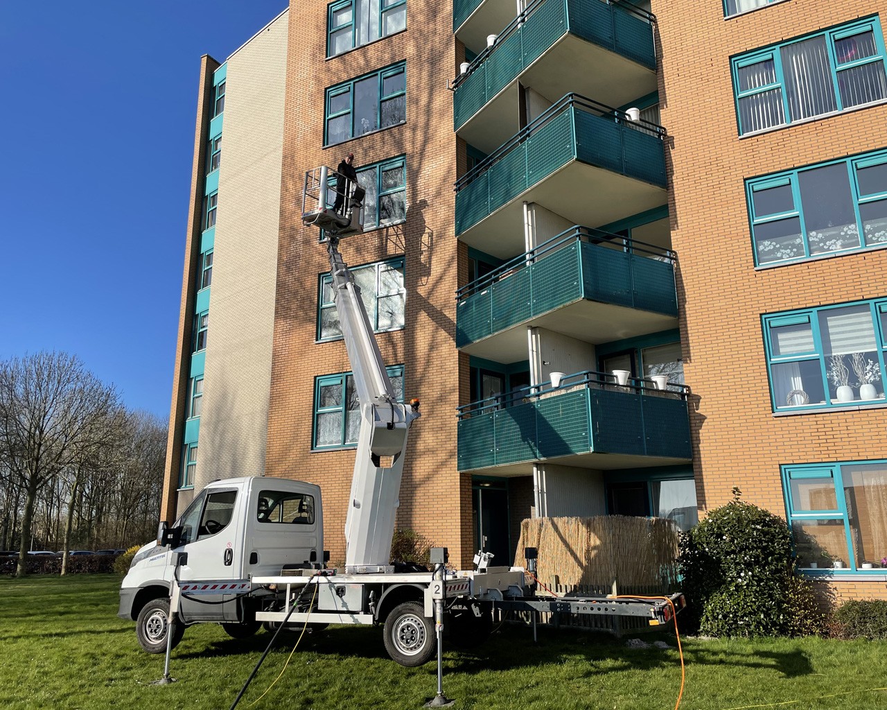 woman in white shirt wearing white helmet