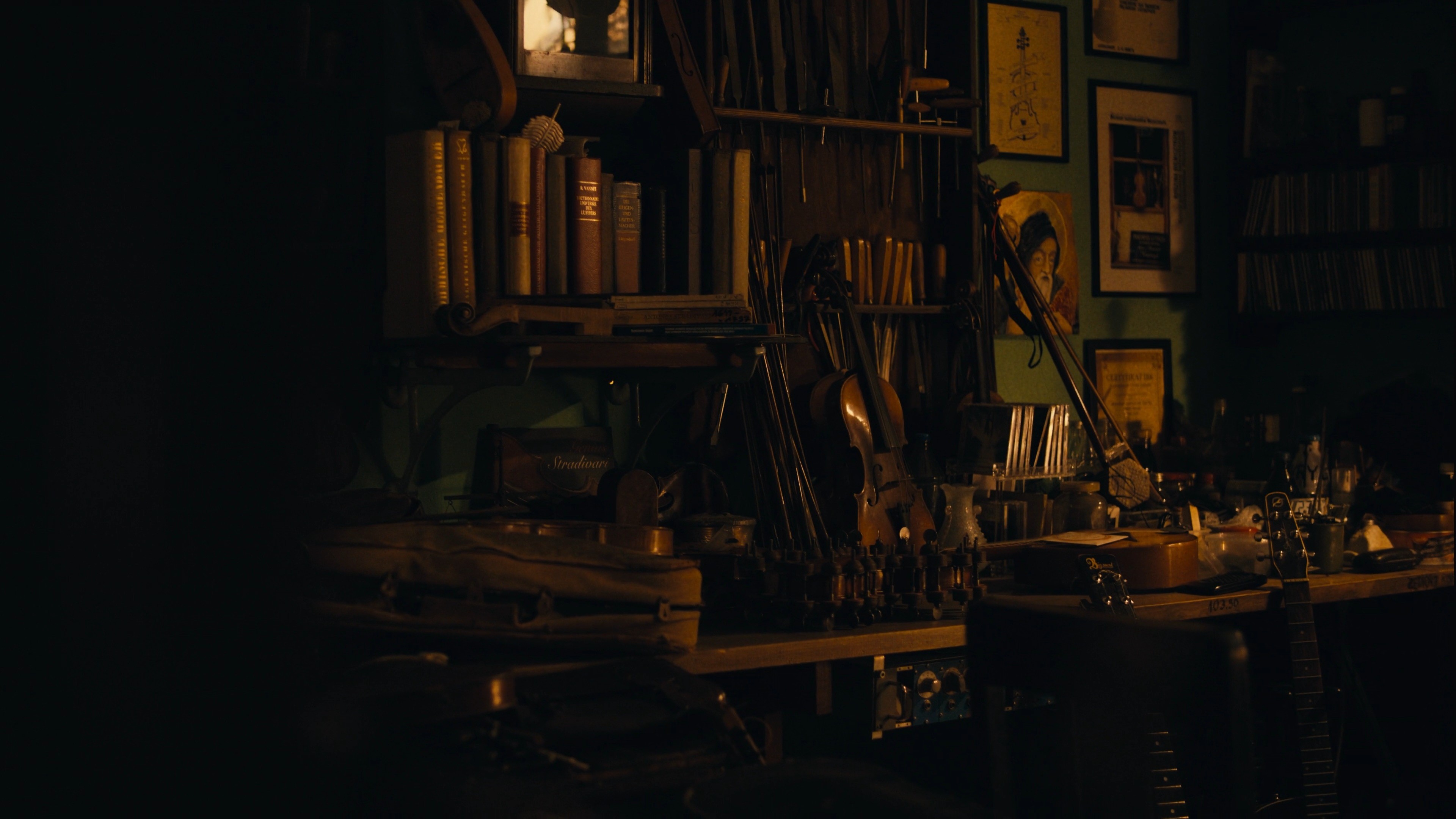 Atmospheric wide shot of a cluttered study room with books and vintage decor.
