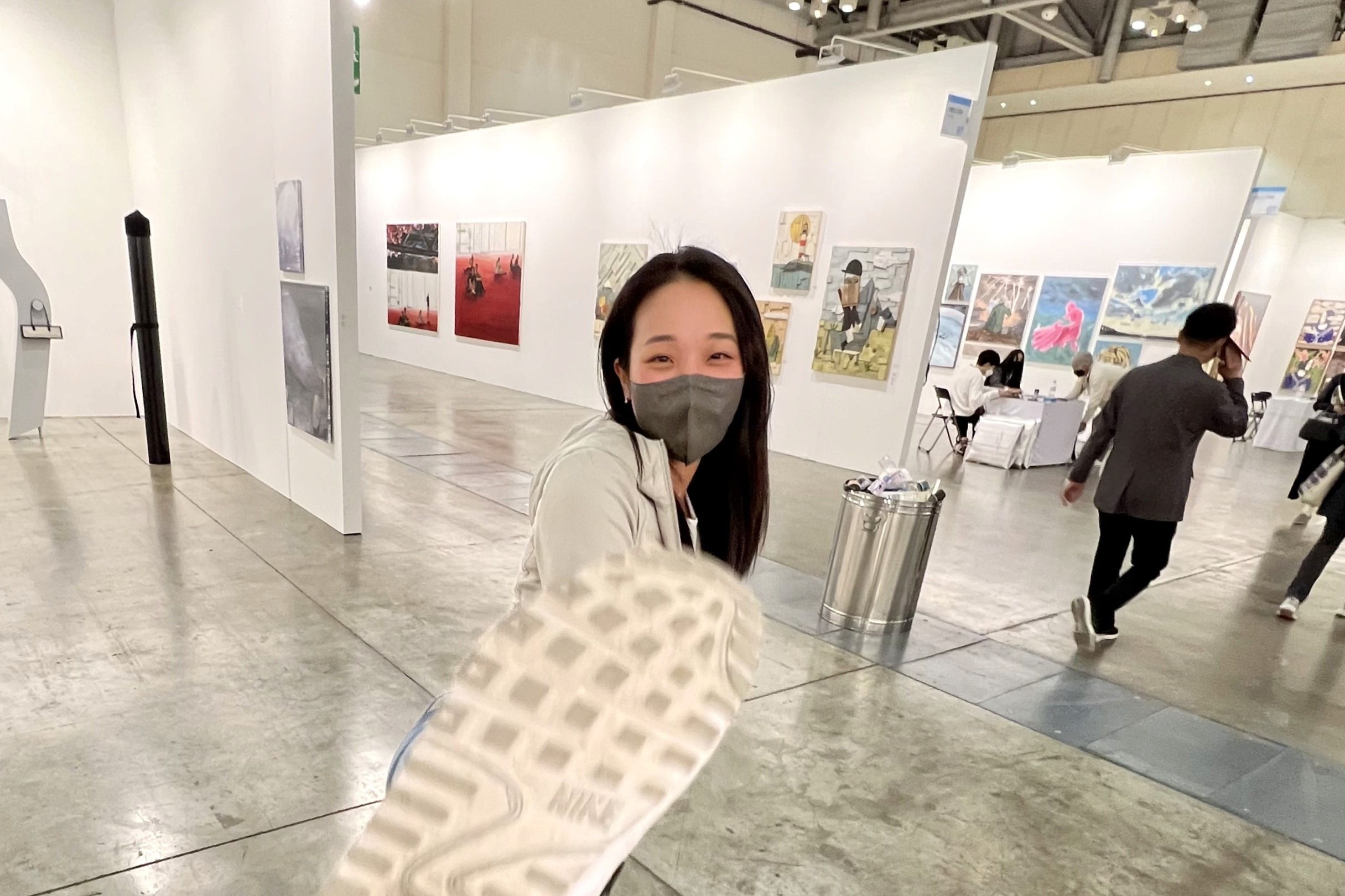 a woman holding an apple