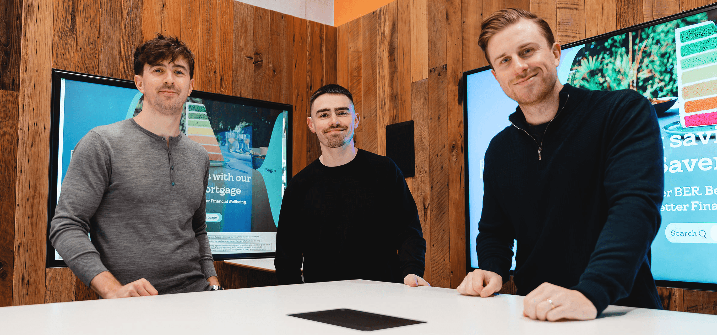 Team members at a modern digital marketing agency collaborating in a professional office environment.