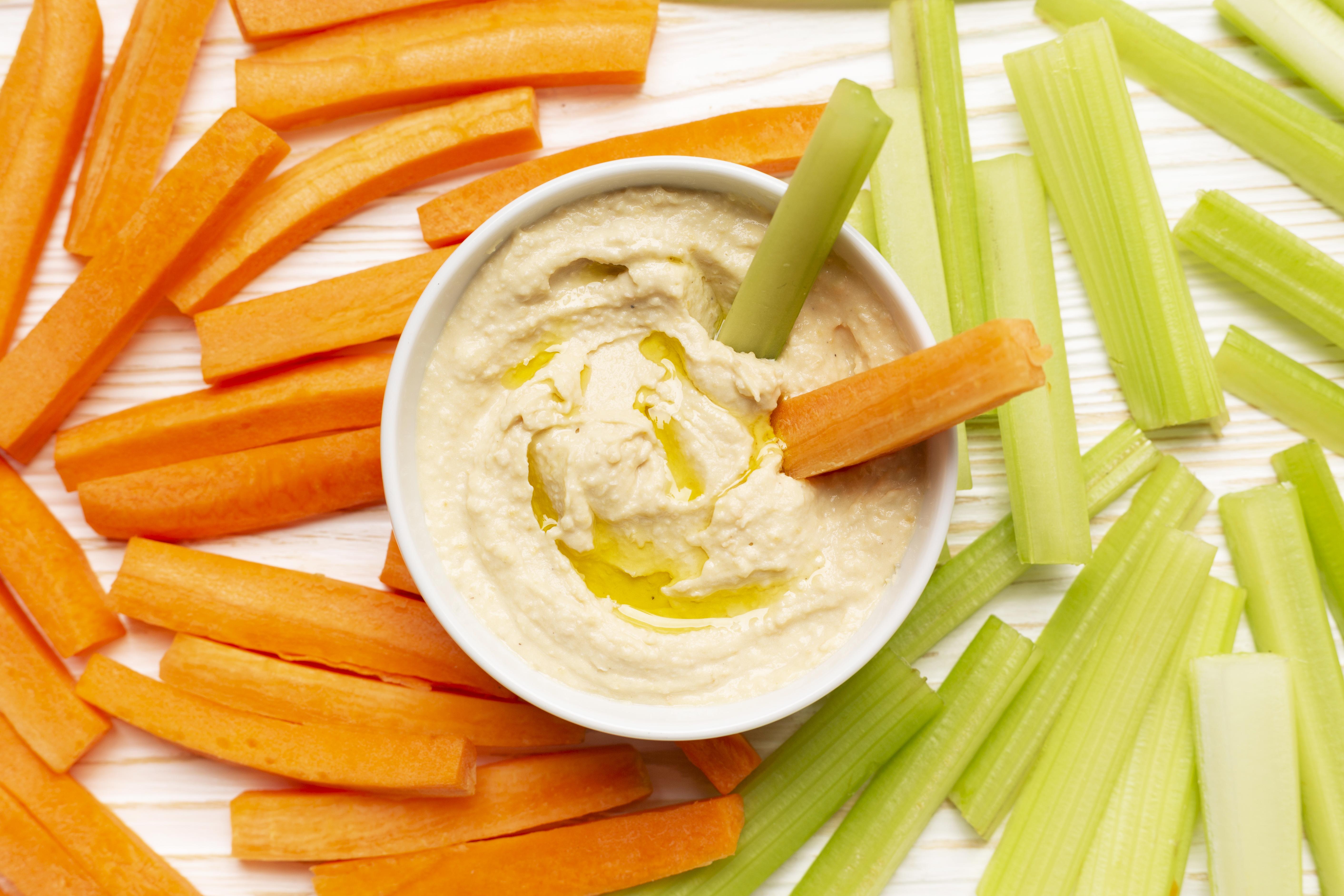 top view of hummus and assorted vegetables
